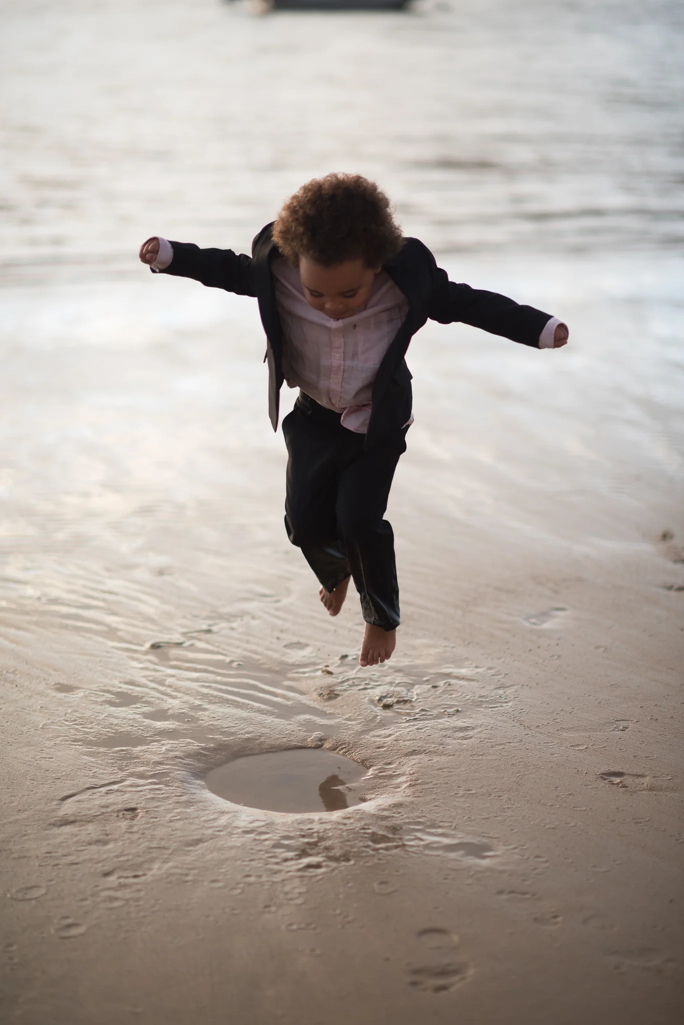 paige boy having fun during wedding photos