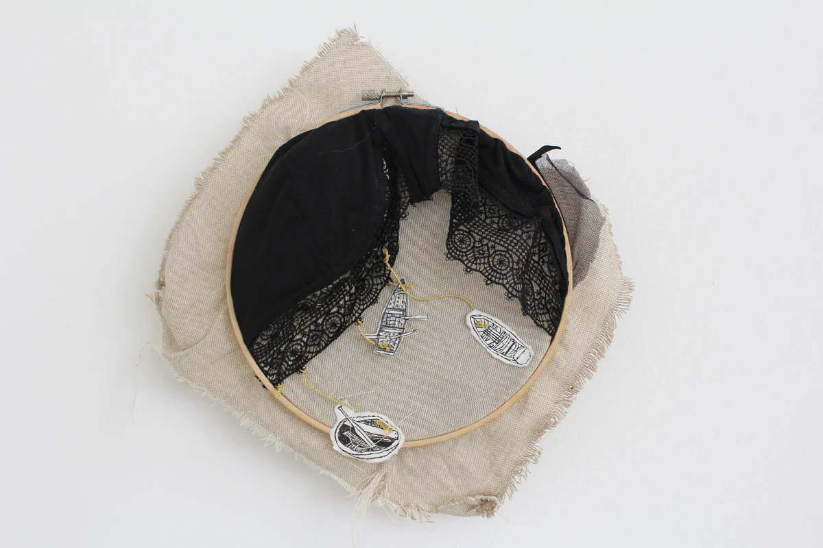 2018, Ink on paper, bra, golden twine, on fabric over embroidery hoop