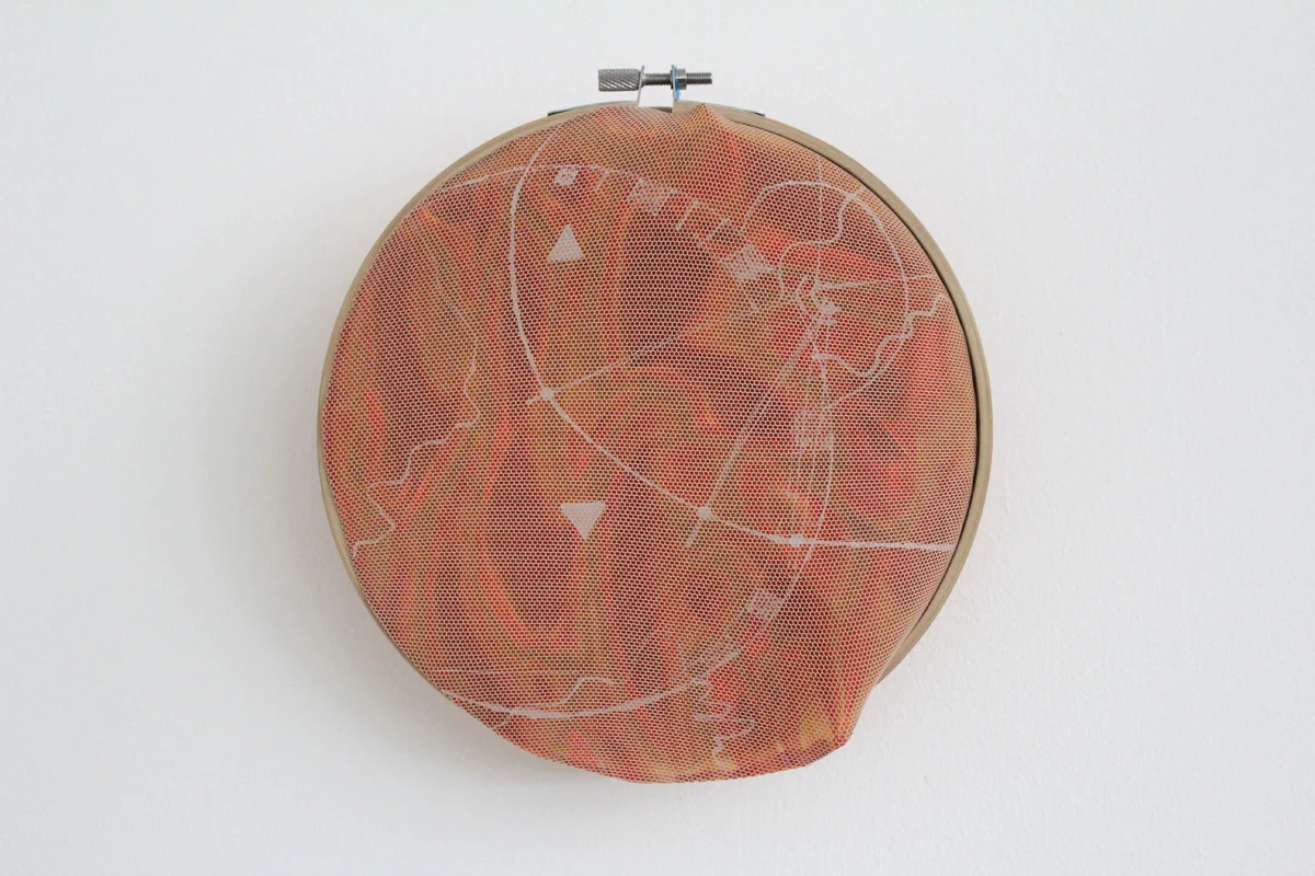2018, Acrylic paint on fabric with holographic plastic over embroidery hoop