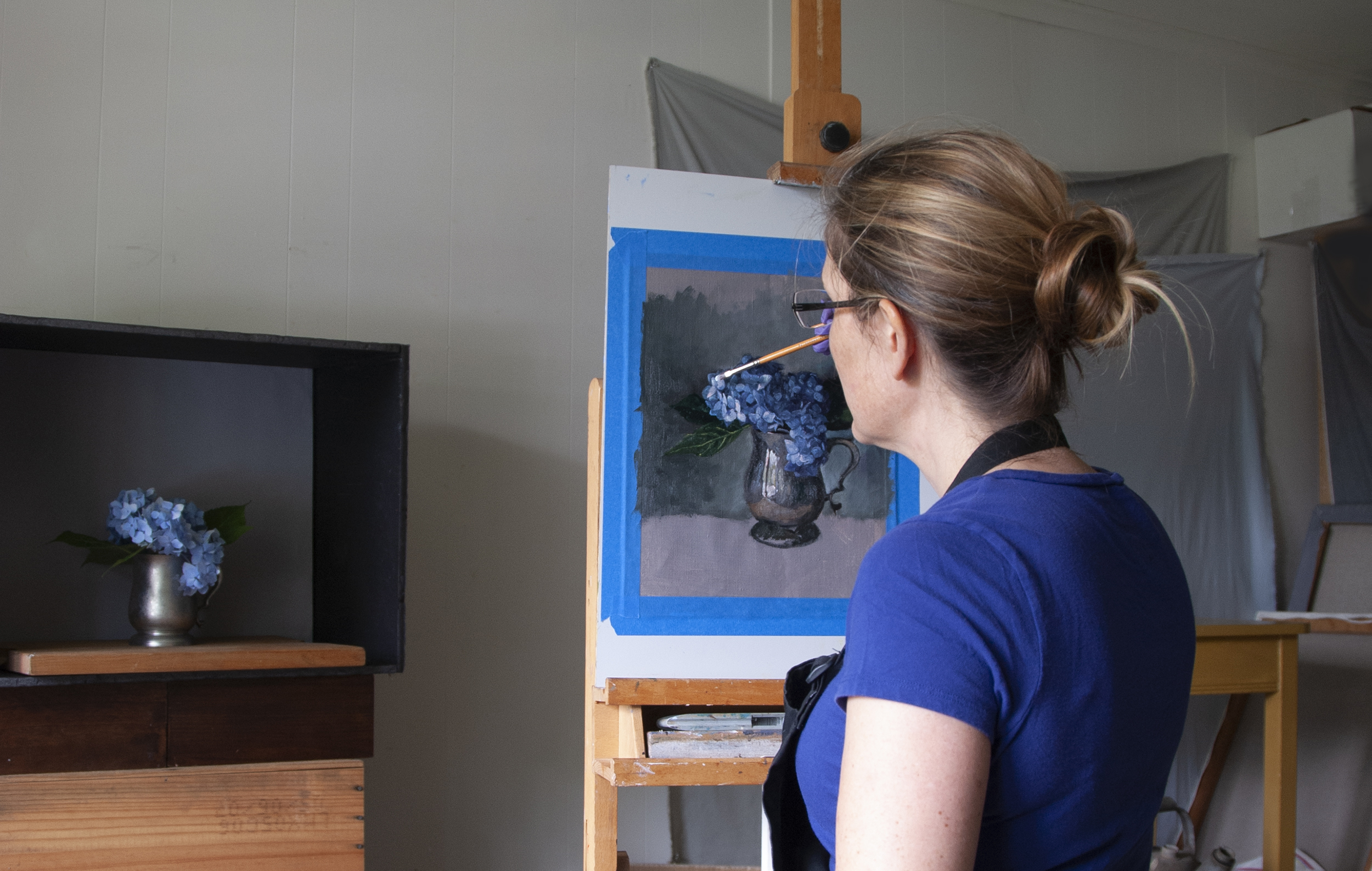 Elizabeth Floyd painting in studio.jpg