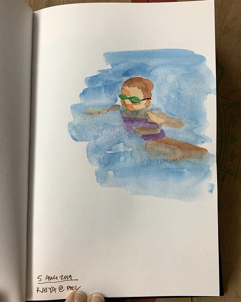 Day 217, August 5, 2019: Watercolor sketch of Kaiya in pool. I love these images of summer…. I think they might end up as an oil painting one day…