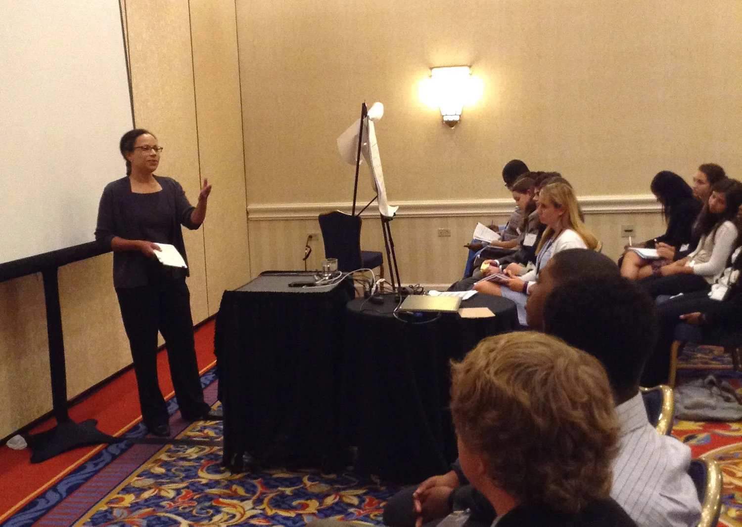 Shauna C. Bryce talks with aspiring lawyers at Envision’s National Youth Leadership Forum, outside Washington, DC.