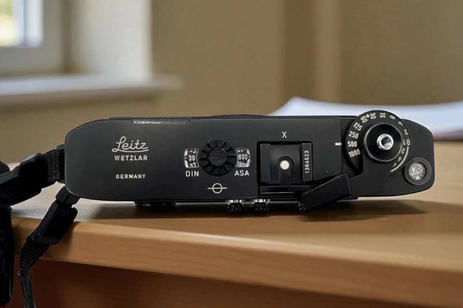 Top plate of the Leica M5 showing its unique front-facing shutter-speed dial, a design that allows quick adjustment while shooting and sets it apart from all other M-mount rangefinders.