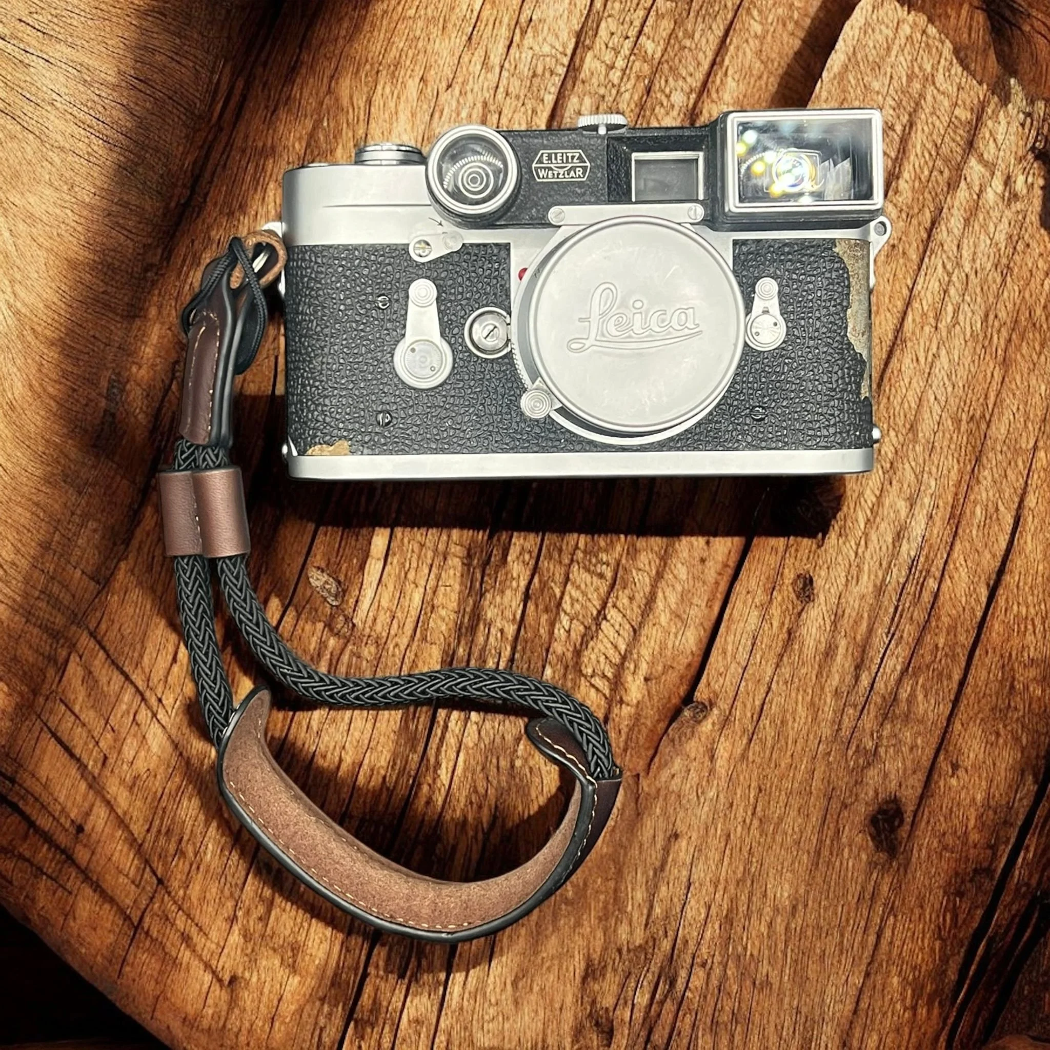 Front view of a Leica M3 with visible vulcanite wear, illustrating the long-term durability and serviceable construction of early Leica M bodies discussed in the article.