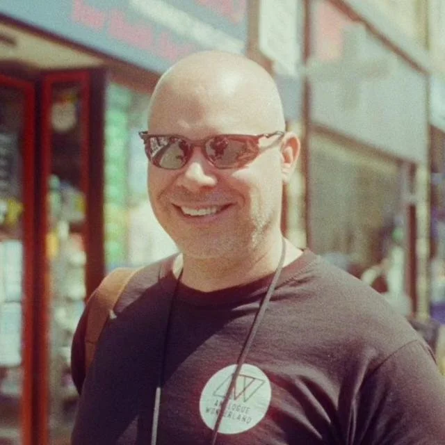 Portrait of Martin Brown, UK film photographer and founder of Liquid Light Whisperer and Liquid Light Lab, teaching workshops on lighting control, ECN-2 film processing, and disciplined analogue workflow.