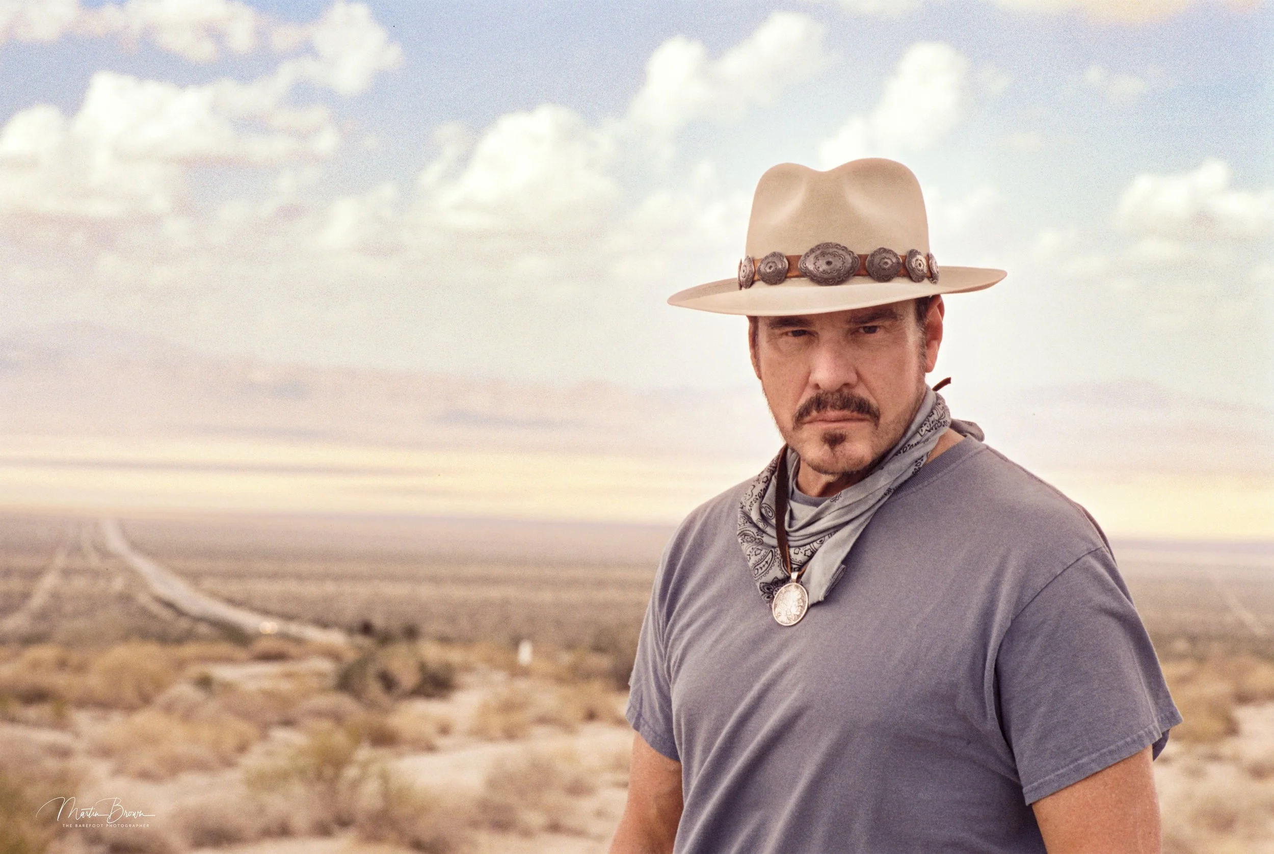 Craig Sheffer photographed in the desert on 35mm film with the Leica M5, Voigtlander 40mm f/1.2, and Silbersalz 50D.