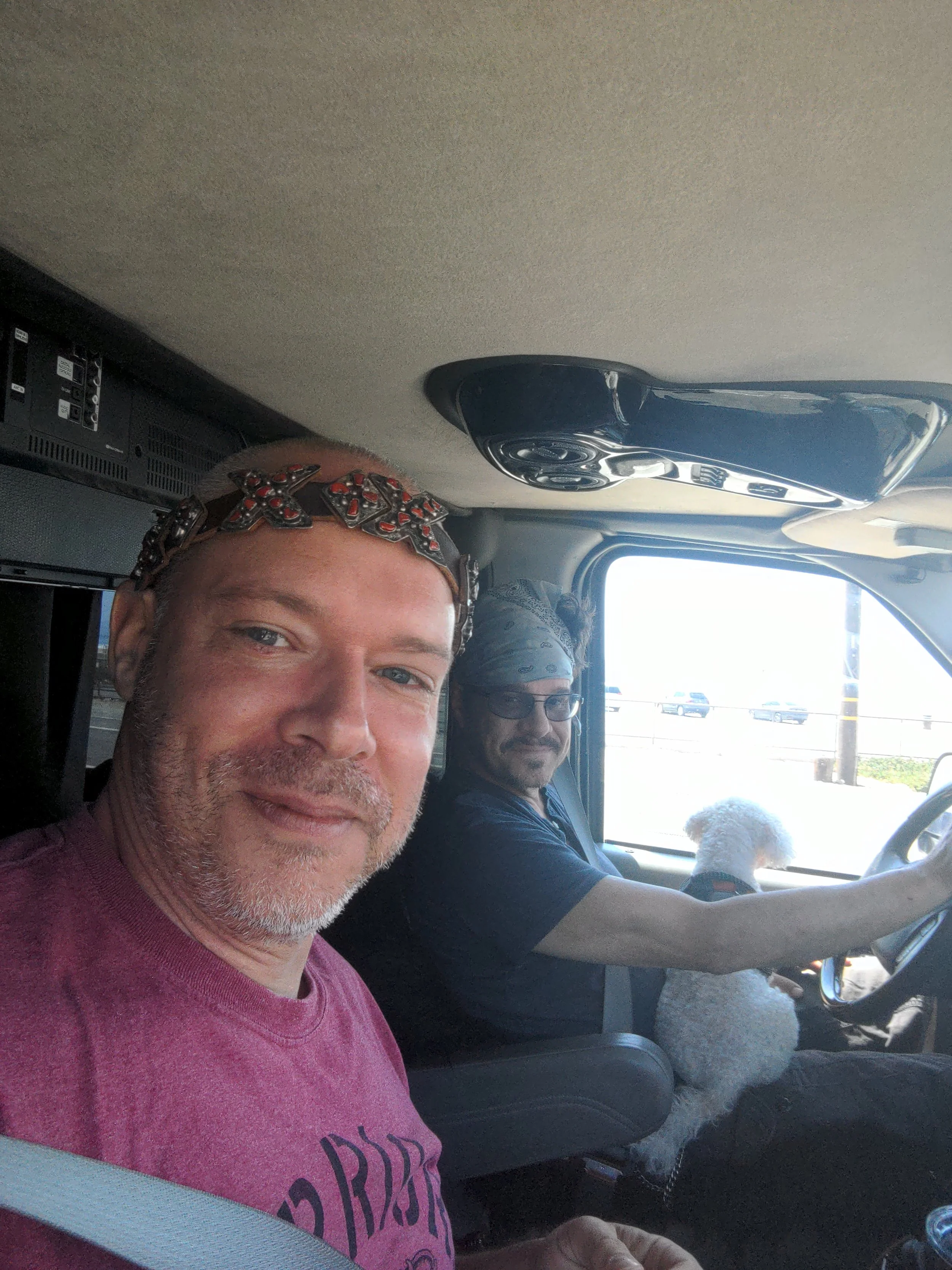 Martin Brown and Craig Sheffer in the van with Craig’s dog at the end of their film photography road trip.