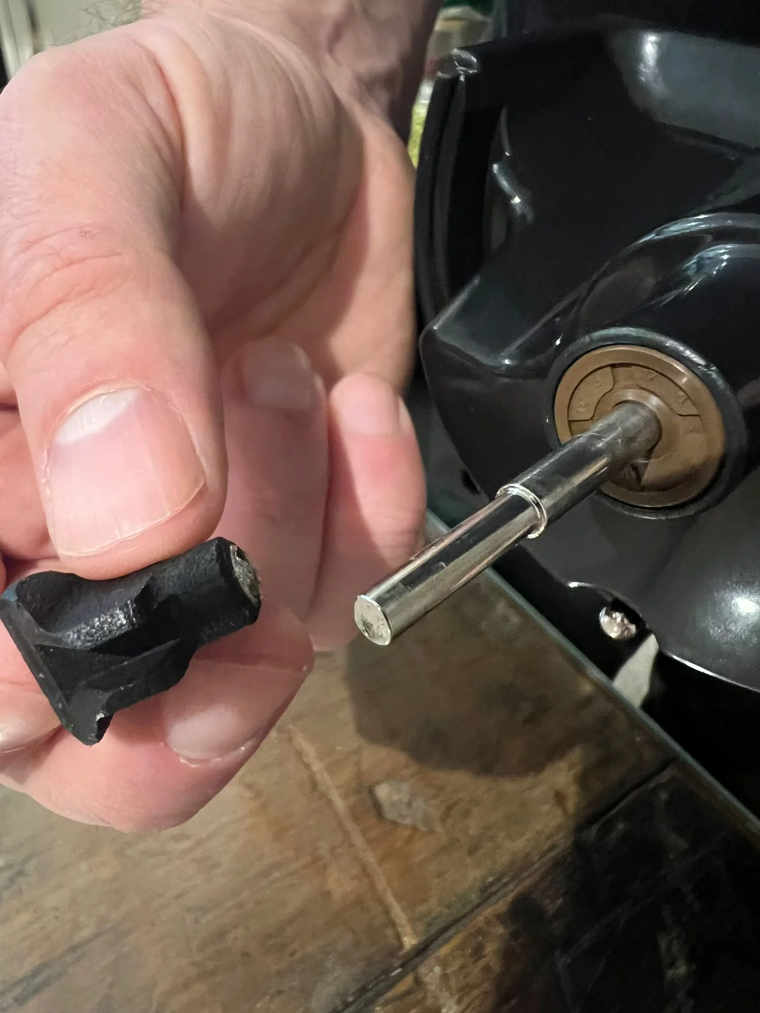 Close-up of loose coupler on AGO film processor before repair.