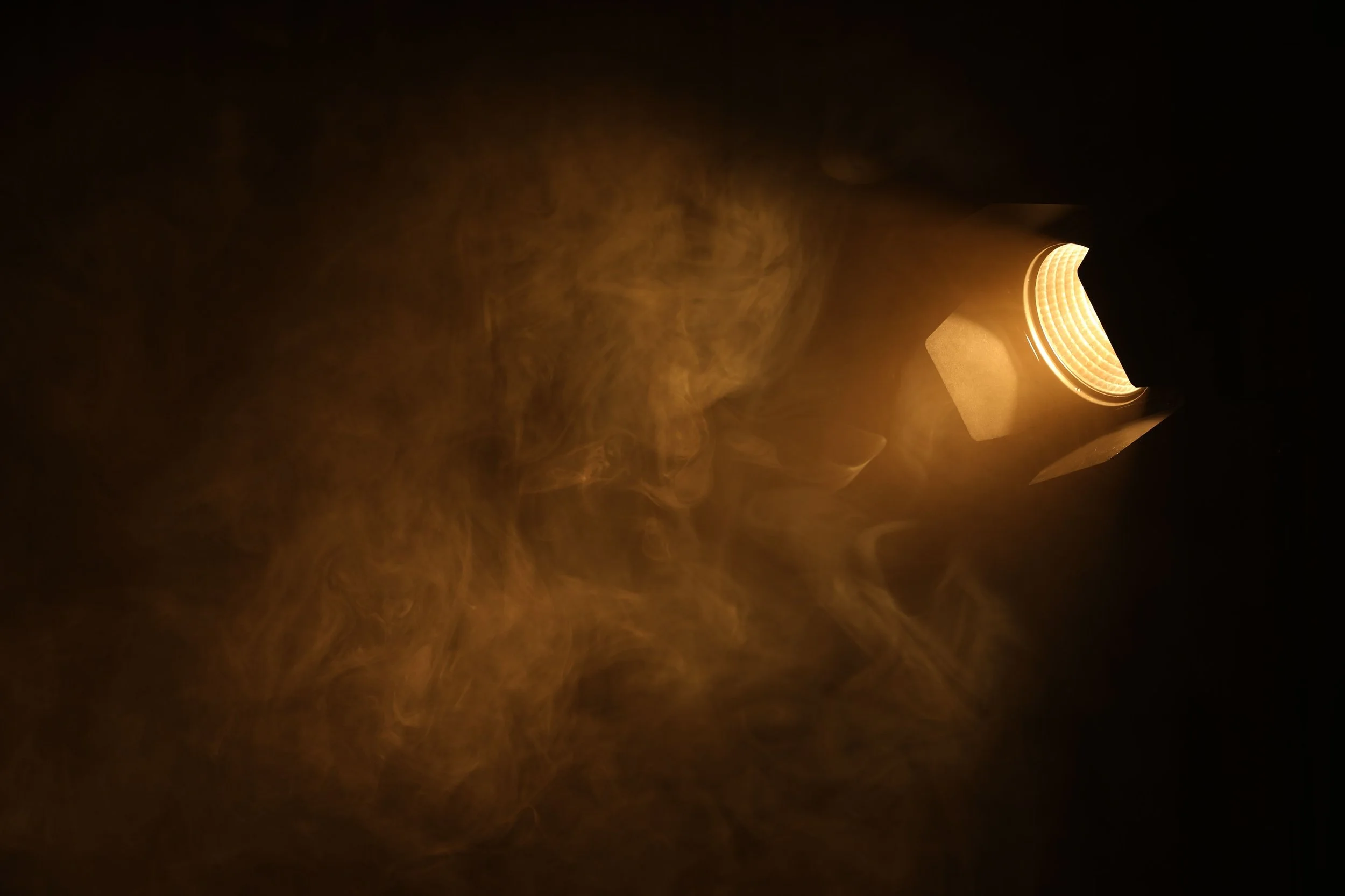 Directional light shaped with barn doors, demonstrating precise control of illumination as a structural decision made before exposure in cinematic film photography.