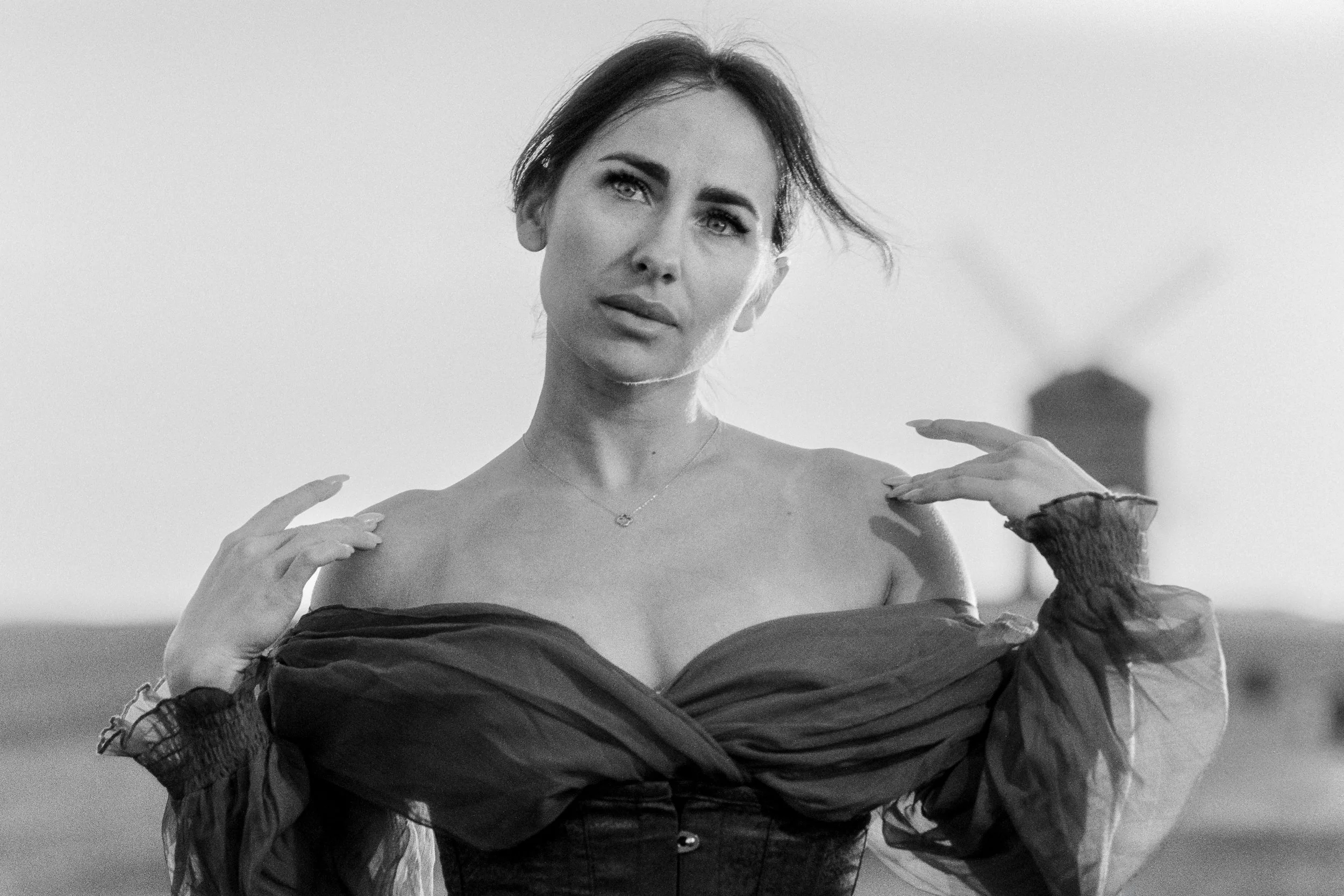 Woman photographed during an on-location portrait session at Chesterton Windmill near Leamington Spa, Warwickshire.