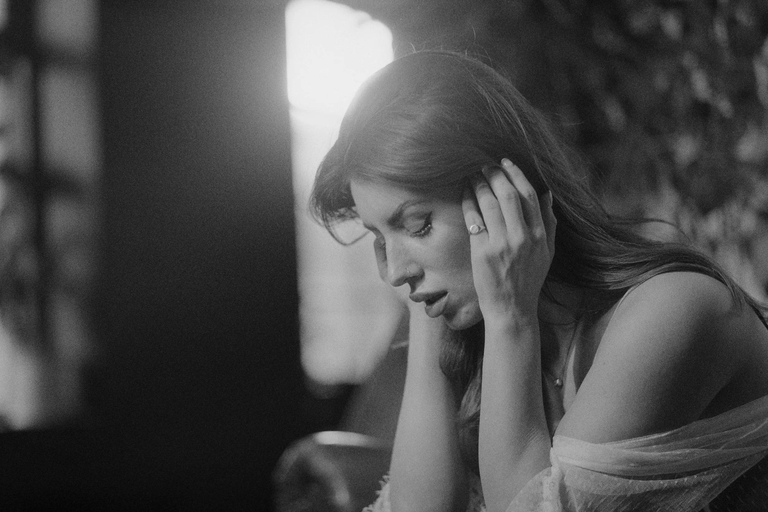 Black and white film portrait illustrating analogue photography practice and visual storytelling