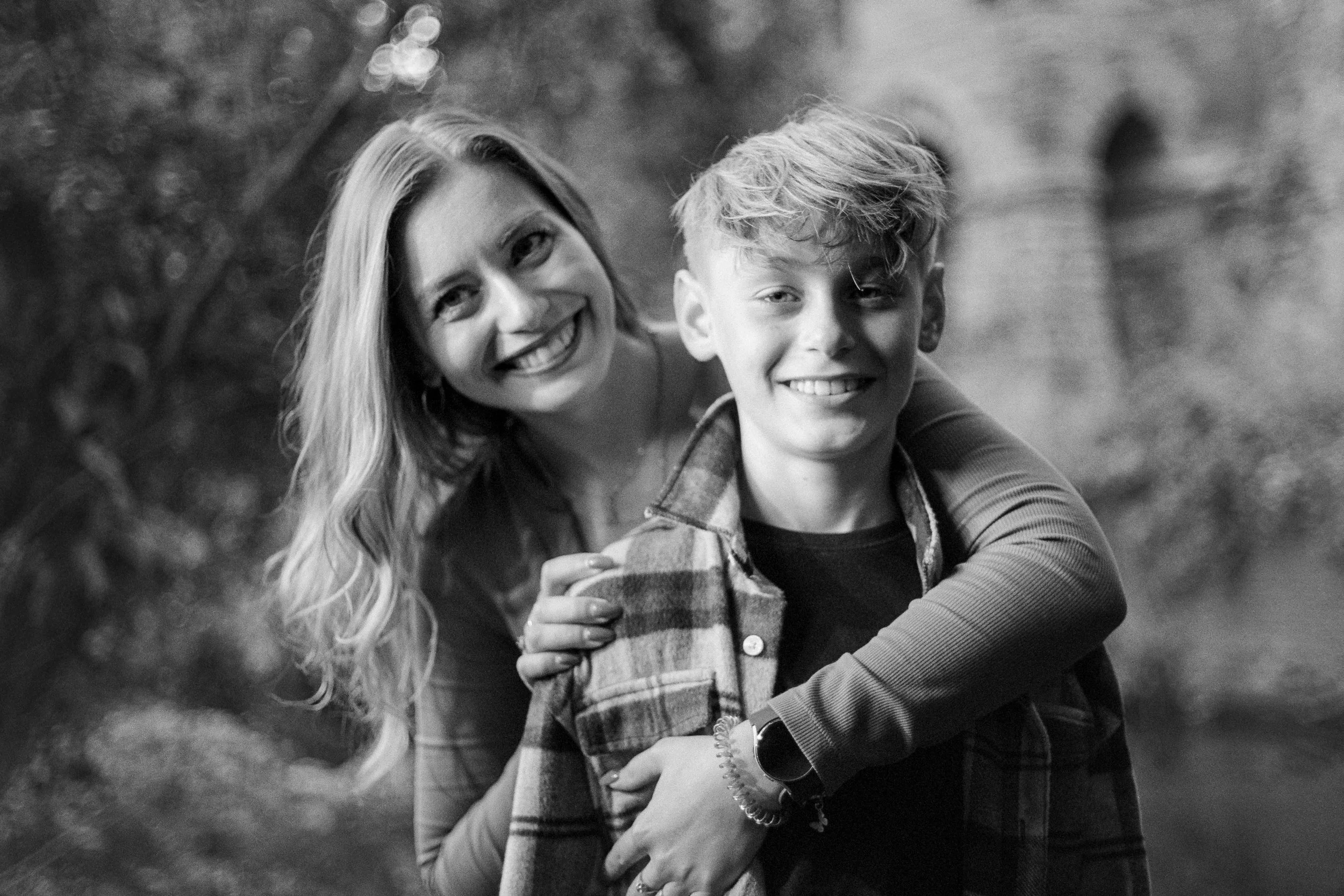 Family portrait photographed on black and white film with a natural, timeless look