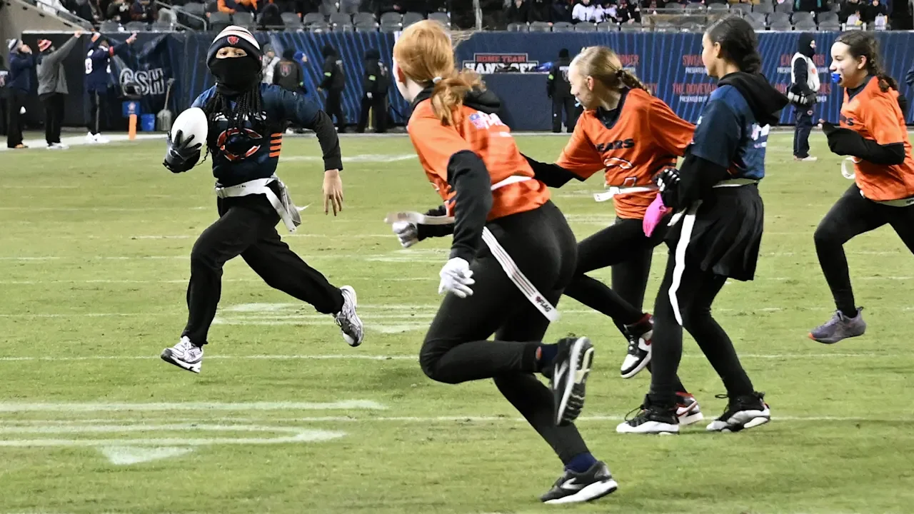 Rockford Park District flag football teams scrimmage at halftime of Bears vs. Packers playoff game