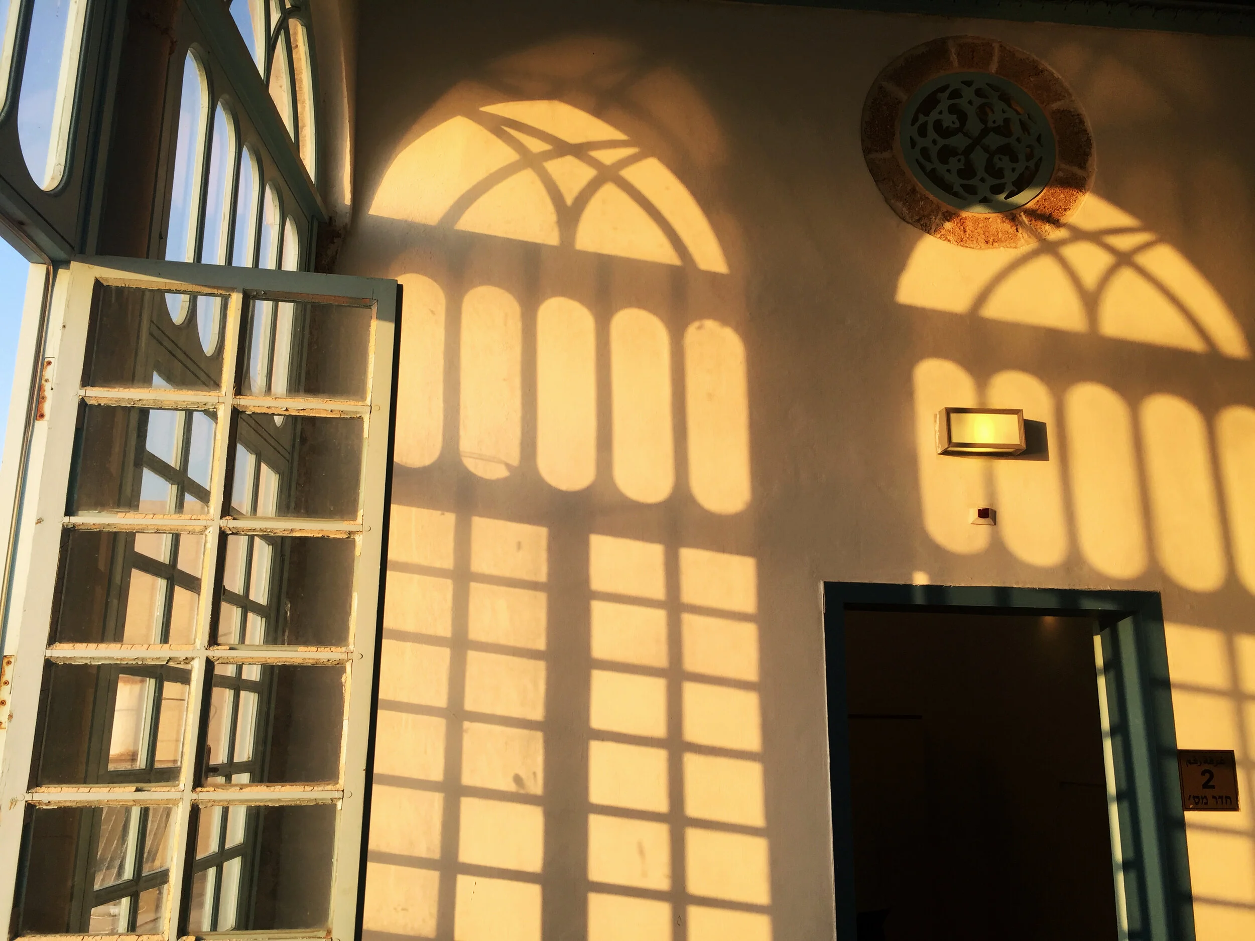 Sun setting in a community center in the old city of Acre.