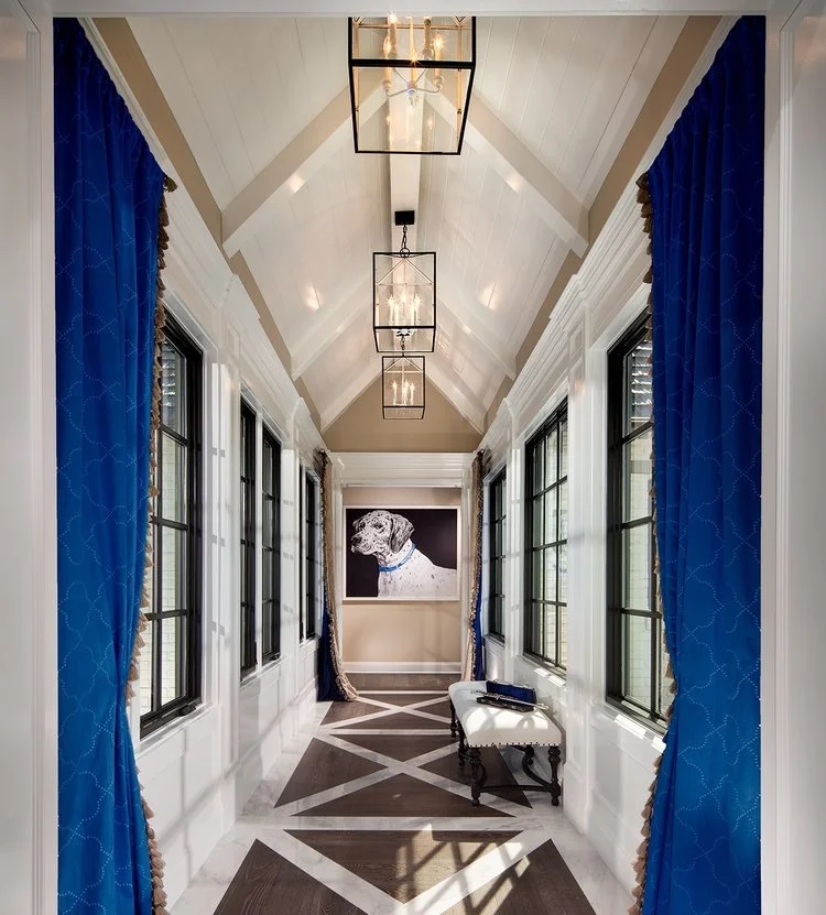 The second story bridge hallway of the Plan Three at The Oaks Farms by Davidson Communities .
