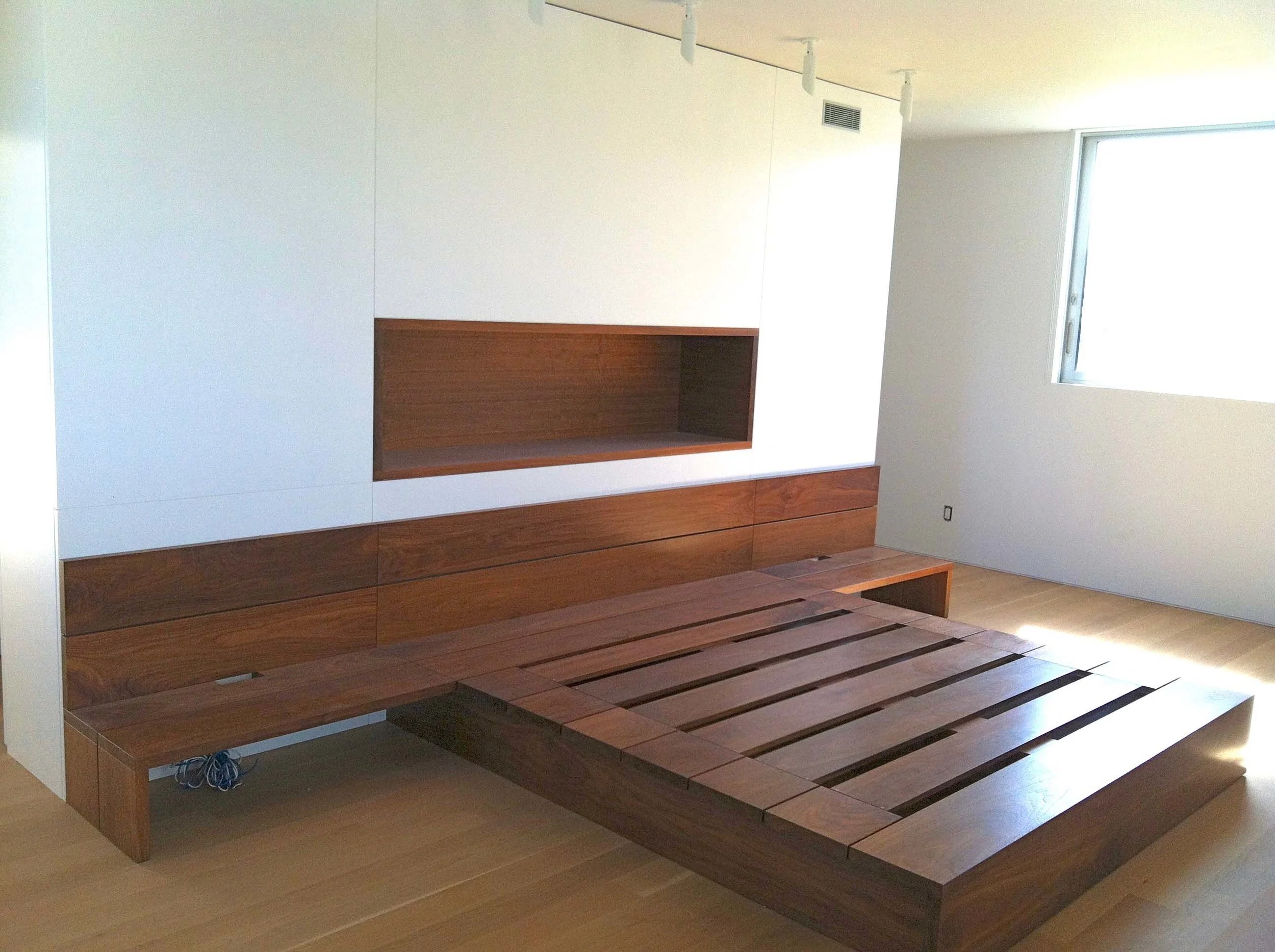 Custom built-in walnut bed 