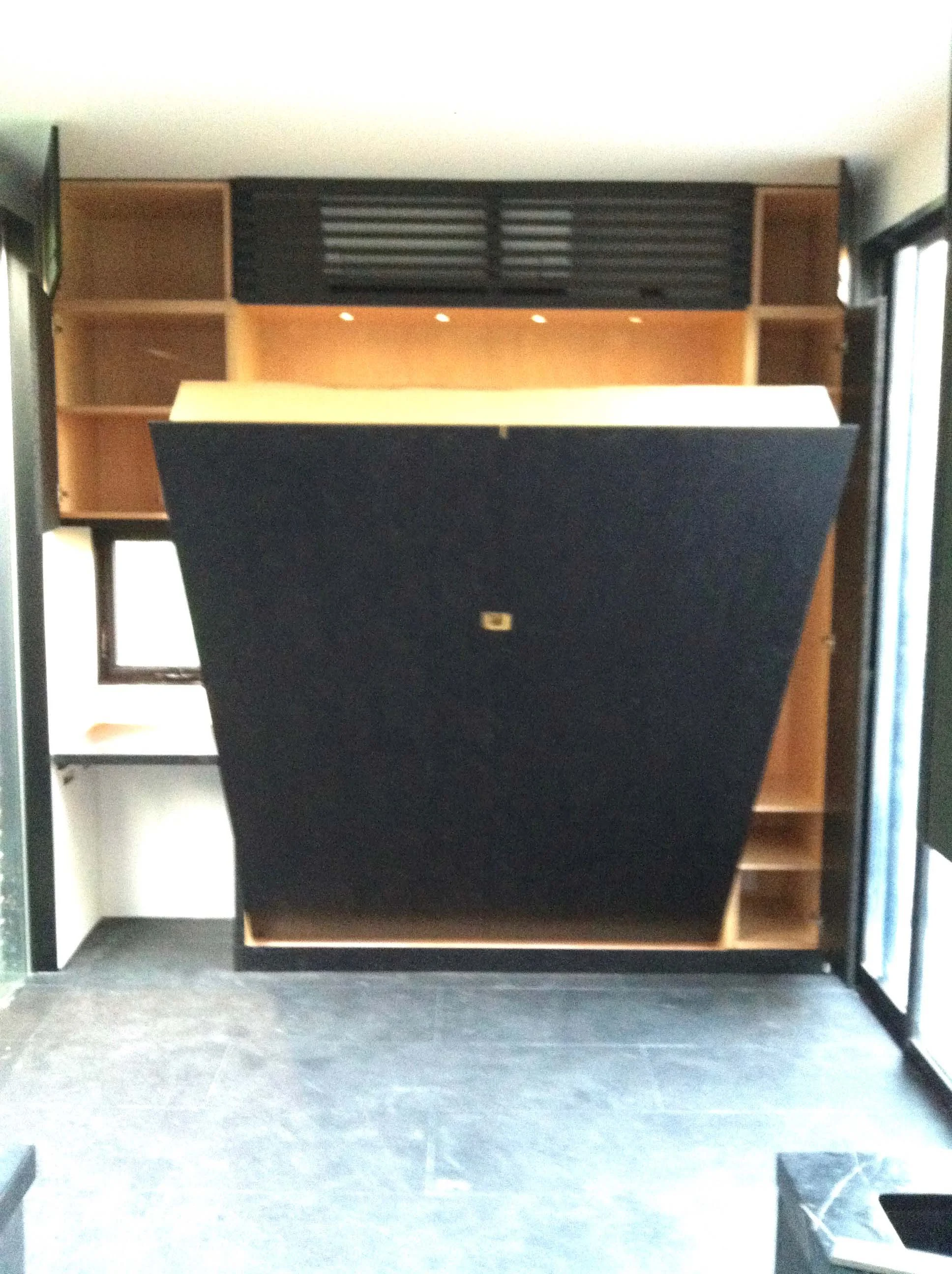Custom murphy bed with stained osb face