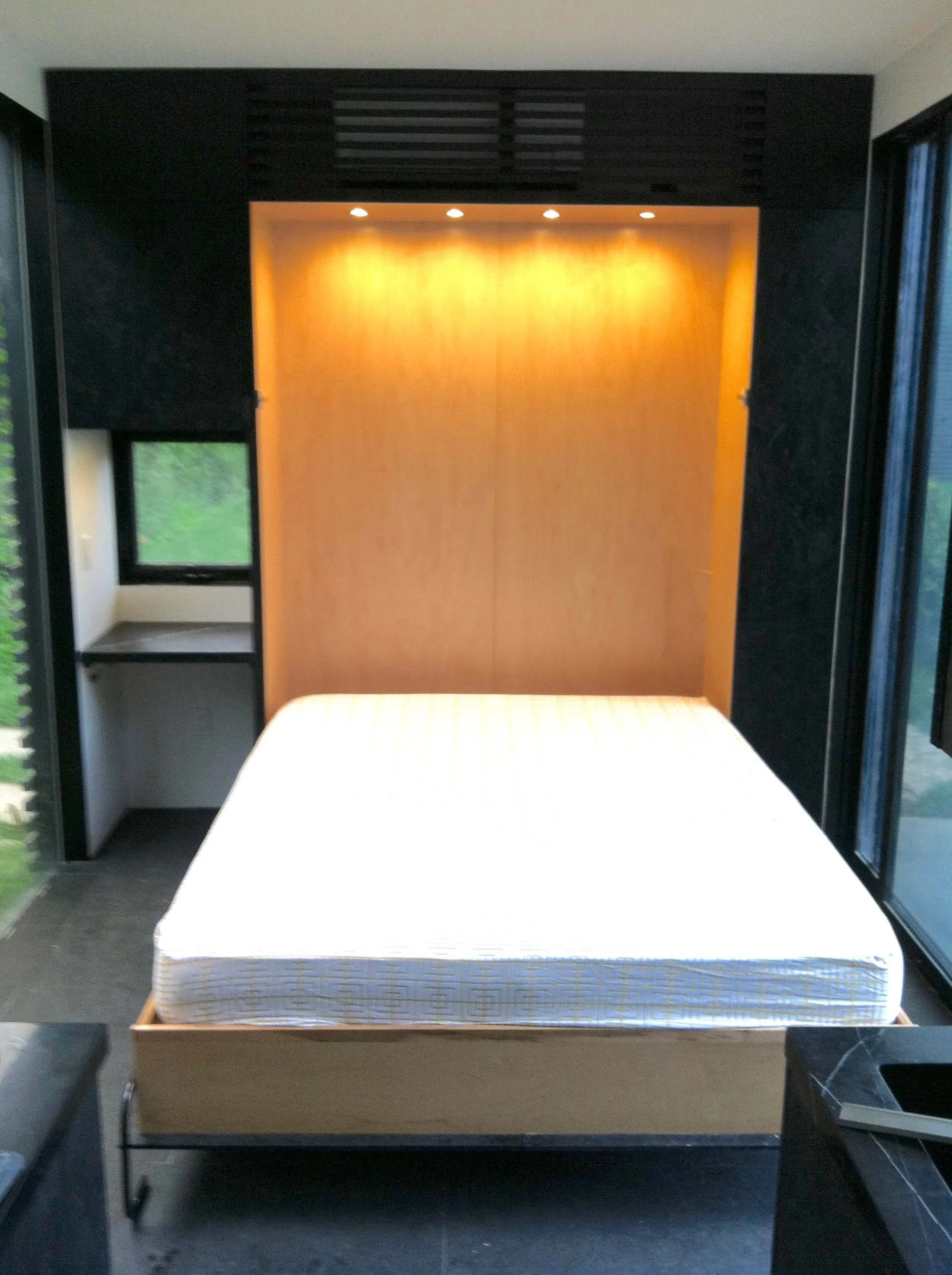Custom murphy bed with stained osb face