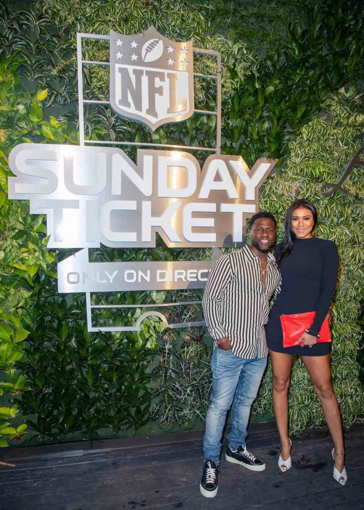 Kevin-Hart-and-Eniko-Parrish-attend-the-DIRECTV-NFL-SUNDAY-TICKET-at-The-Bungalow-party-in-Miami.-Jesus-ArangurenAP-Images-for-DIRECTV-copy-scaled.jpg