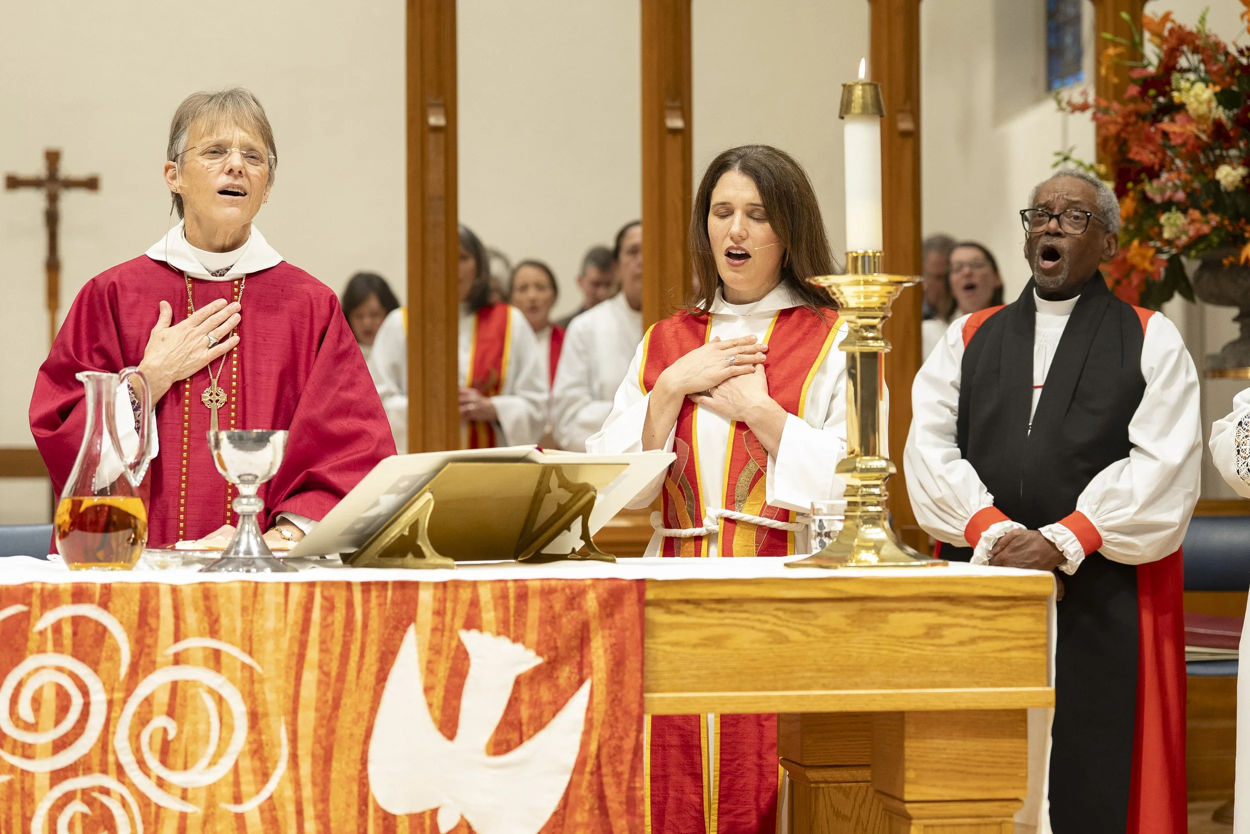  Bishop Mariann Budde and the Most Rev Michael Curry celebrate with Hillary as she is installed at St. Columba’s church.  