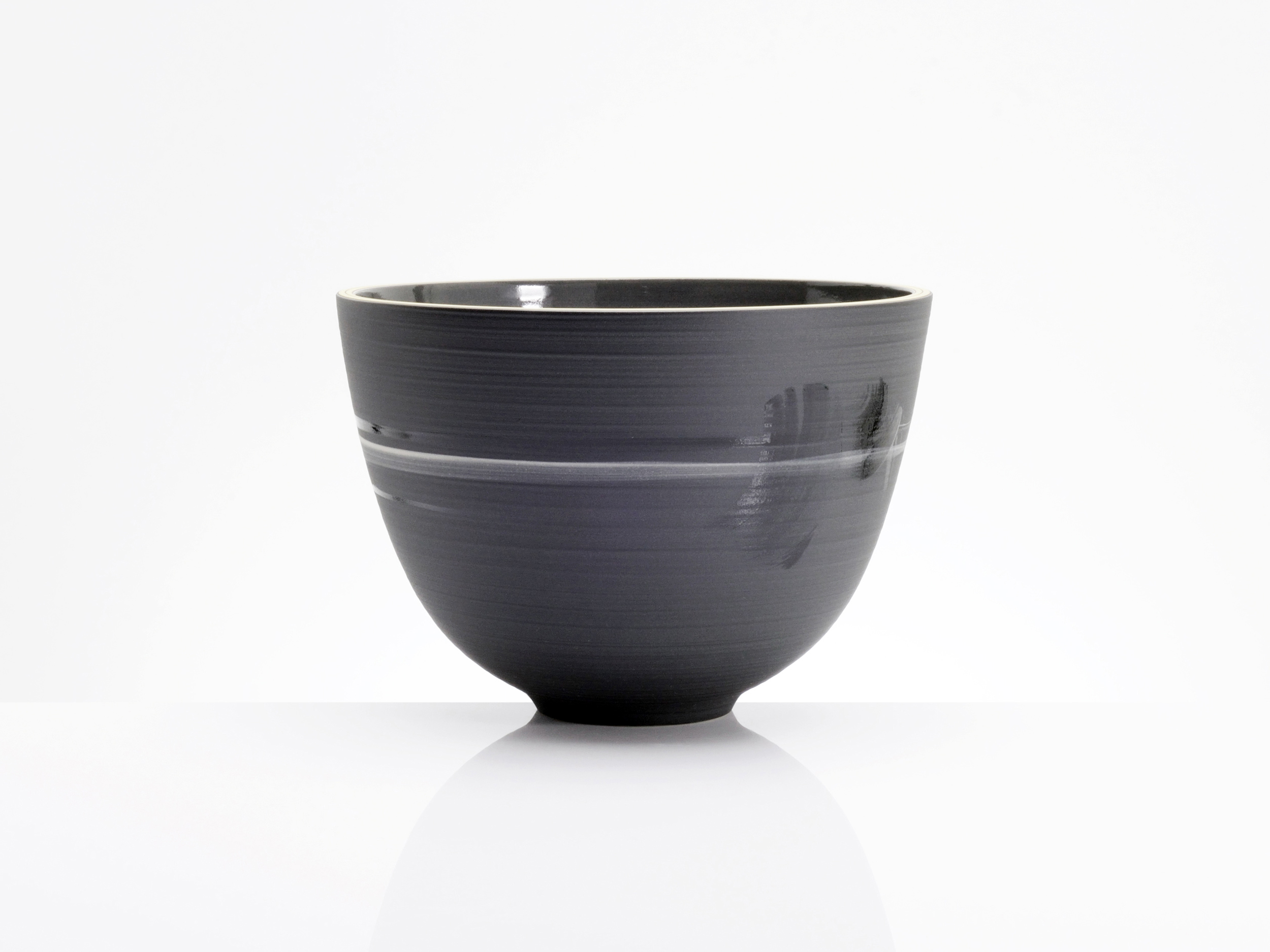 Elegant Harmony Black Ceramic Bowl by Rowena Gilbert