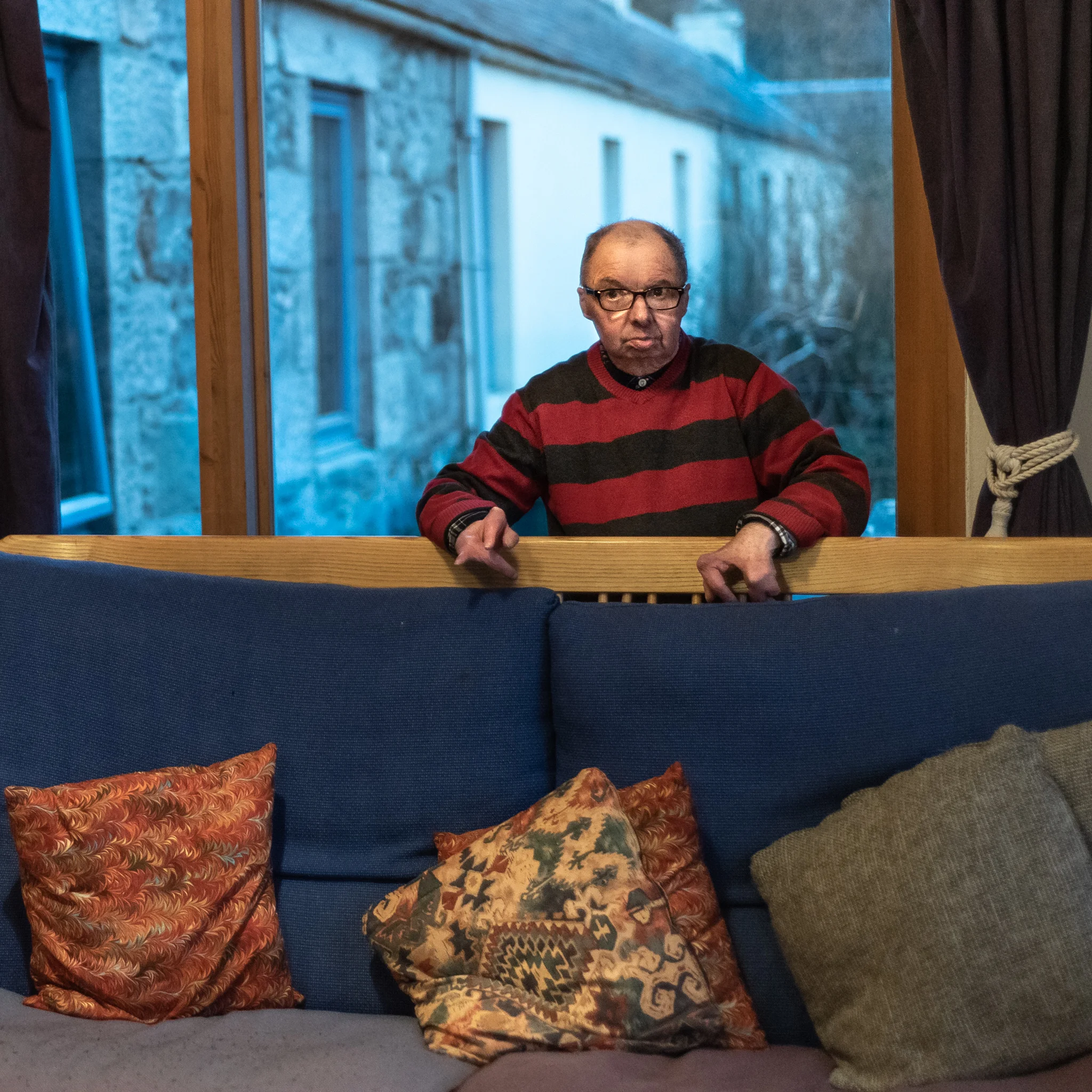 Hugh Behind Sofa-1.jpg