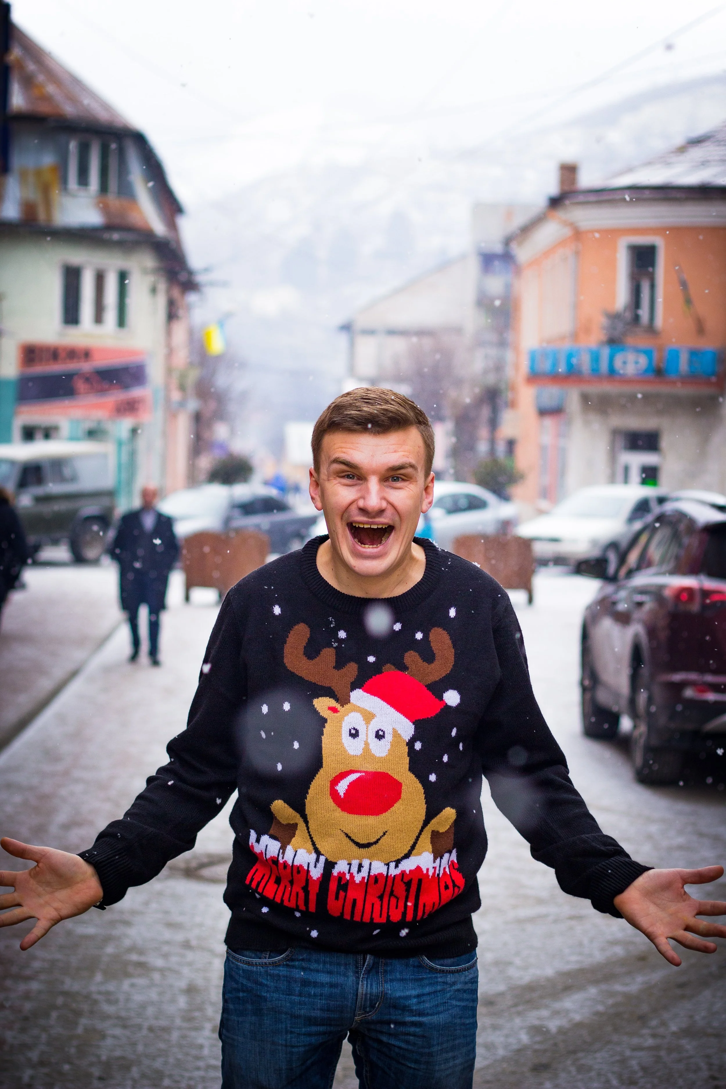 Man wearing a Christmas sweater