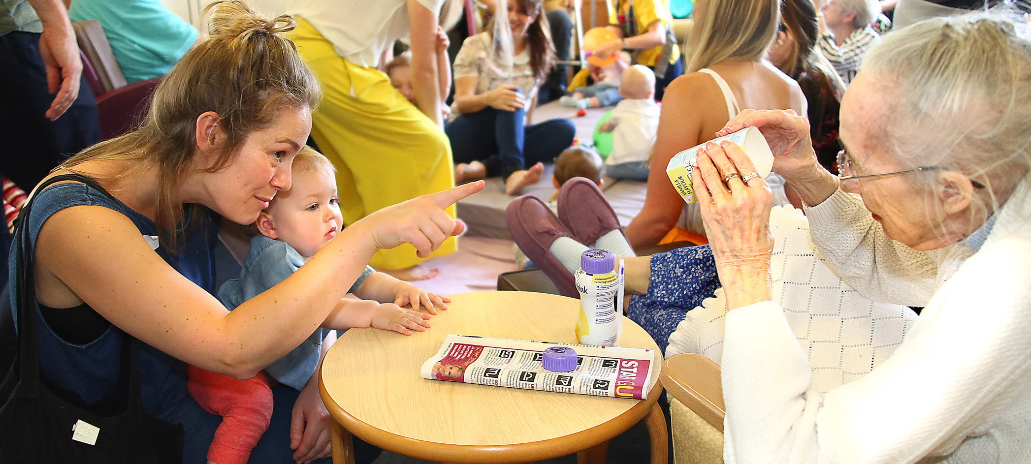 Christine, Dawn and baby Mabel at Songs & Smiles in Ross Wyld Care Home, Walthamstow (the home sadly closed in 2018)
