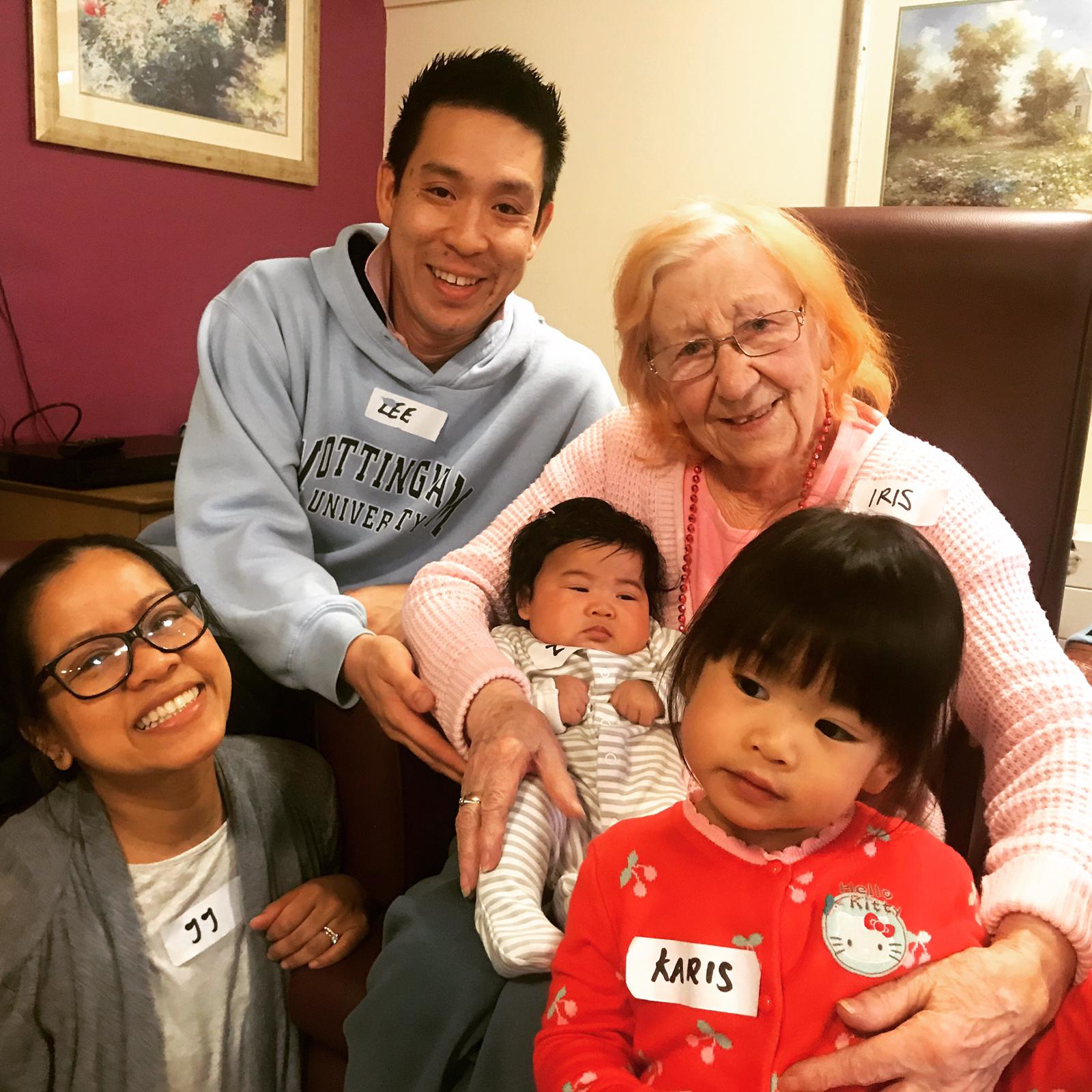 Lee, JJ, Karis and baby Zoe getting to know Iris at Summerdale Court in Canning Town