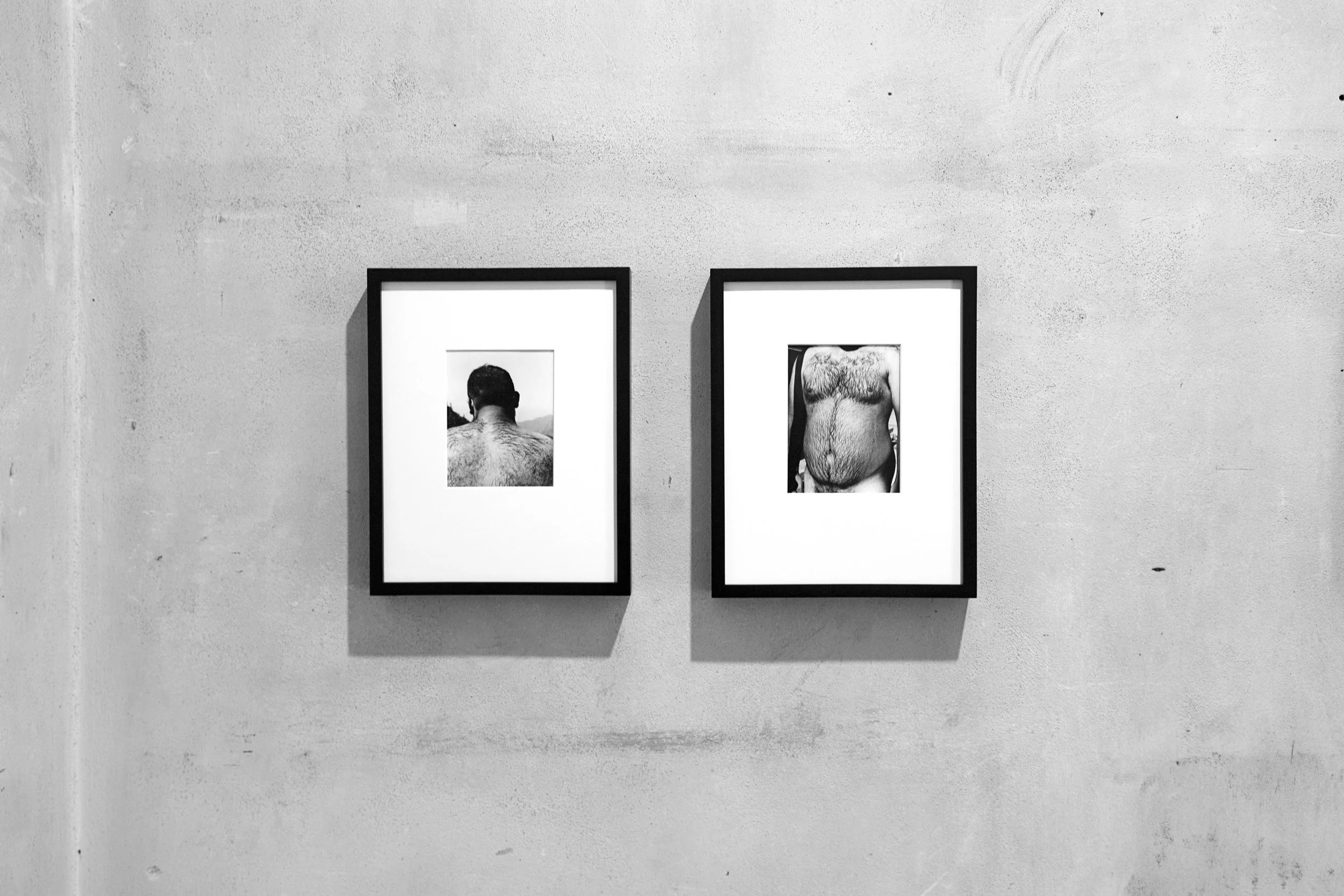 Installation view. L to R: "Mountains", "River." All works over-matted, silver gelatin prints in 8.5x11in. painted wood frame. 
