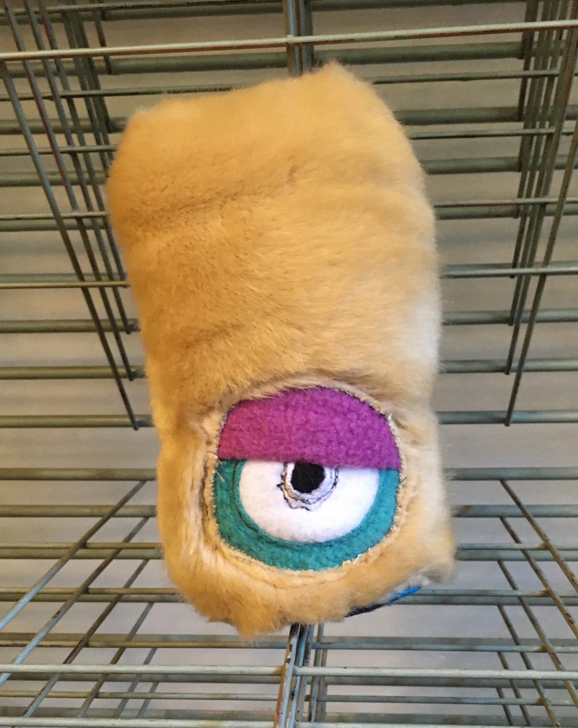 SMALL TAN ONE EYED MONSTER