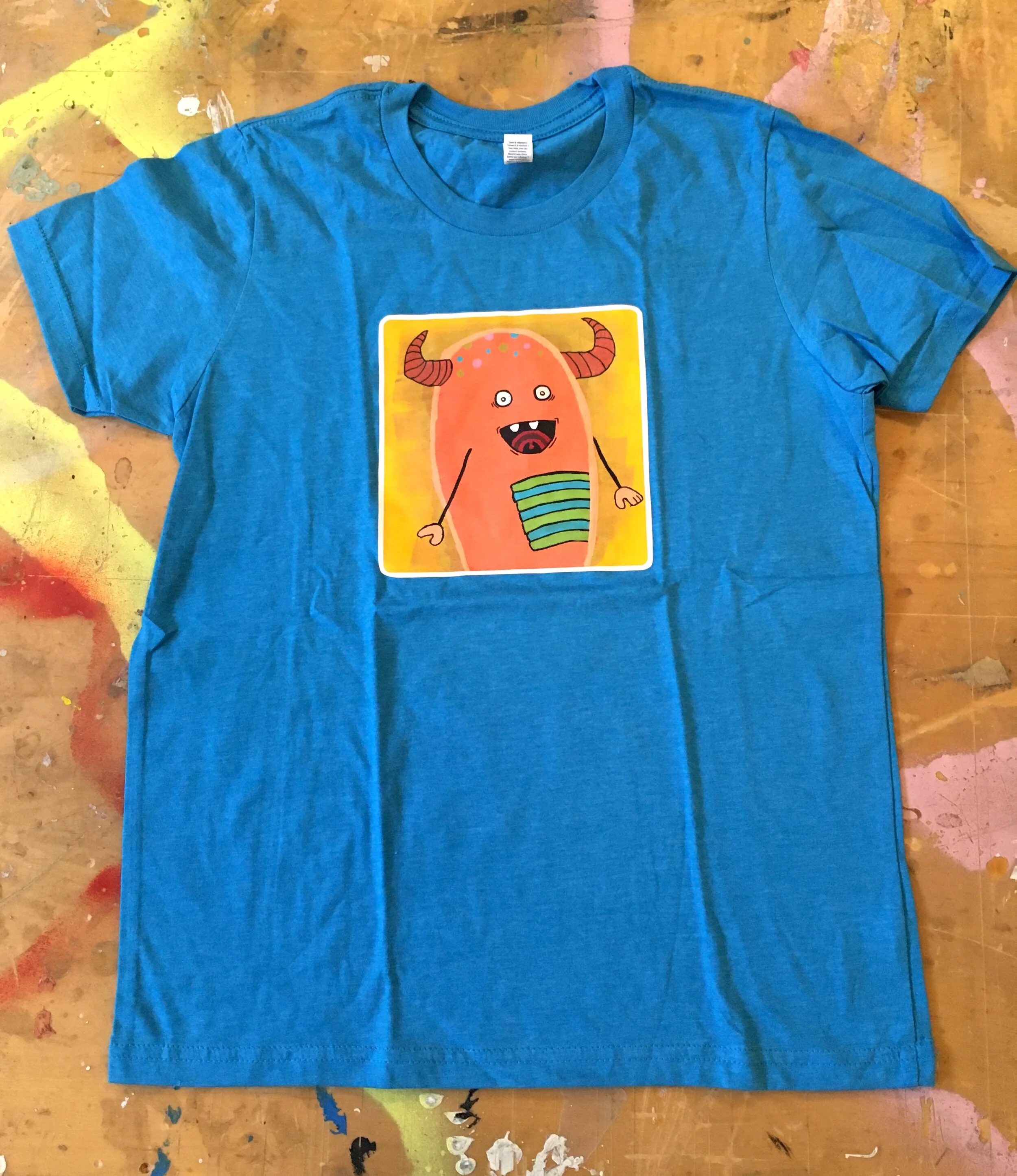 ORANGE WITH HORNS BLUE YOUTH L TEE 1.JPG