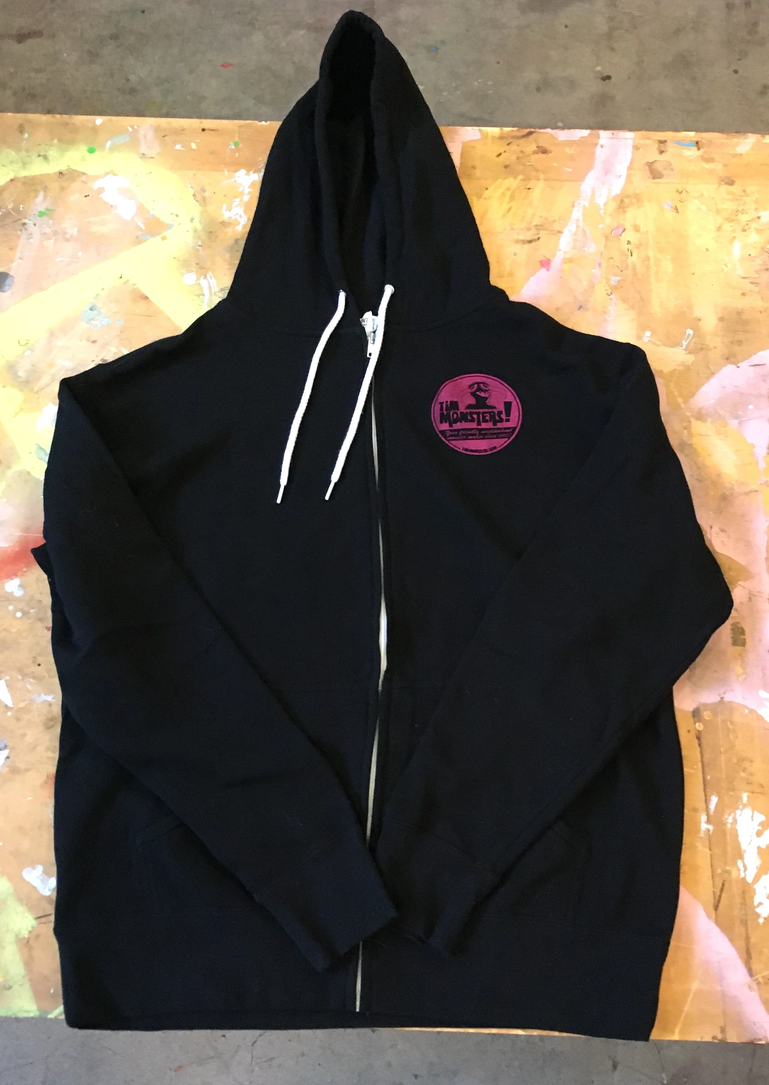 TM BLACK SCREEN PRINTED HOODIE FRONT 1.JPG