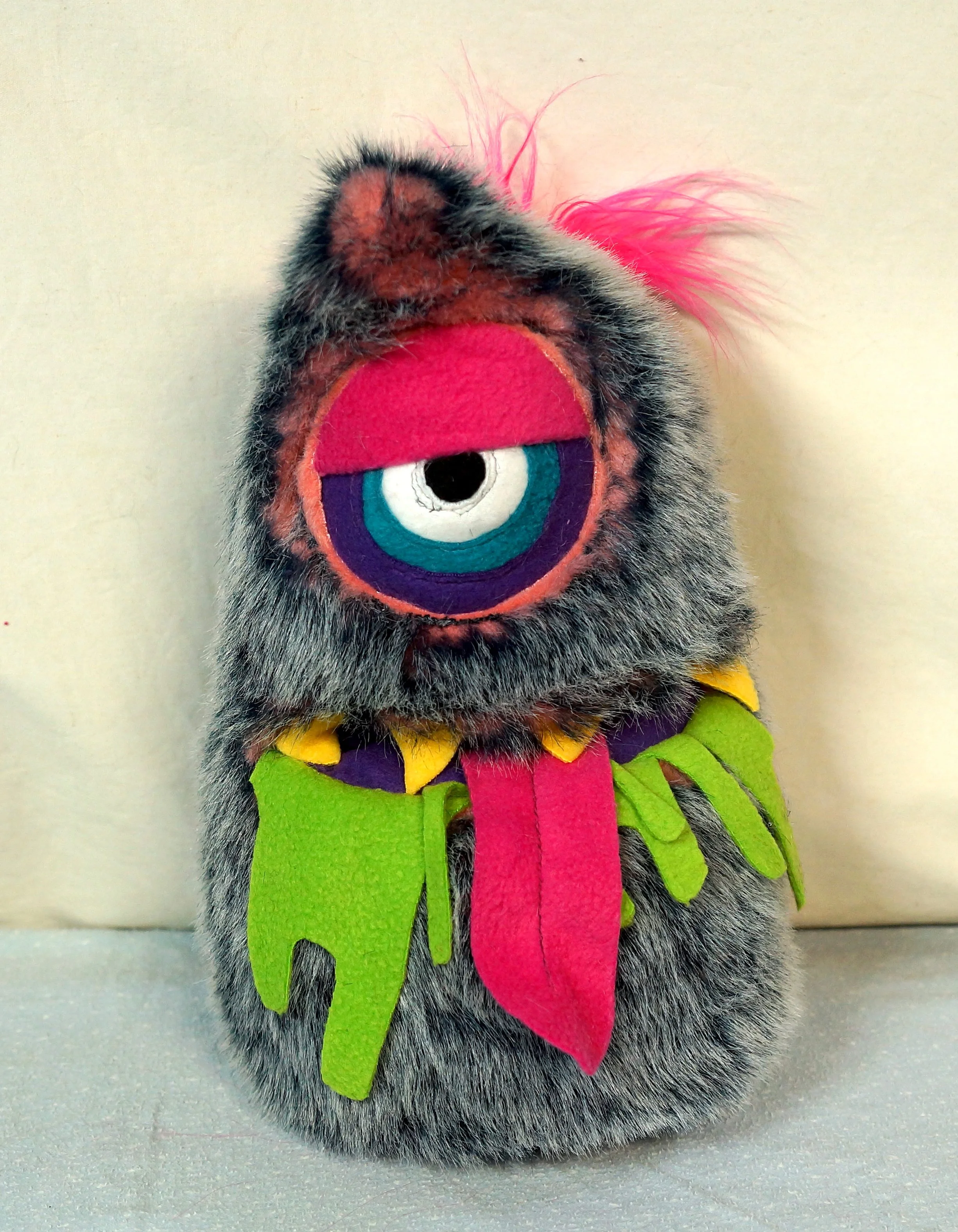 MEDIUM GRAY/PINK ONE EYED MONSTER WITH POCKET MOUTH AND DROOL