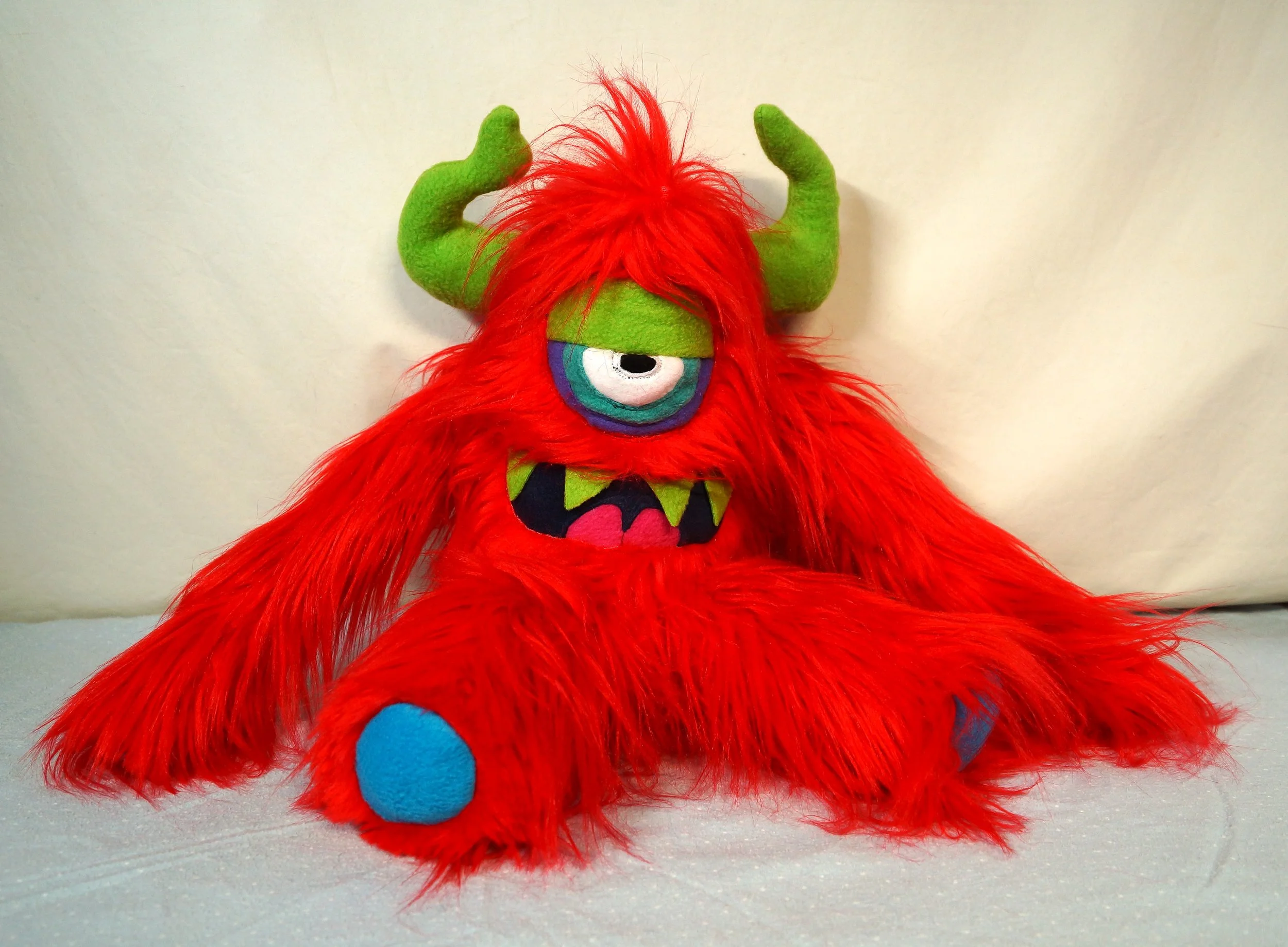 LARGE RED MONSTER WITH HORNS LEGS AND ARMS — TIM MONSTERS! -