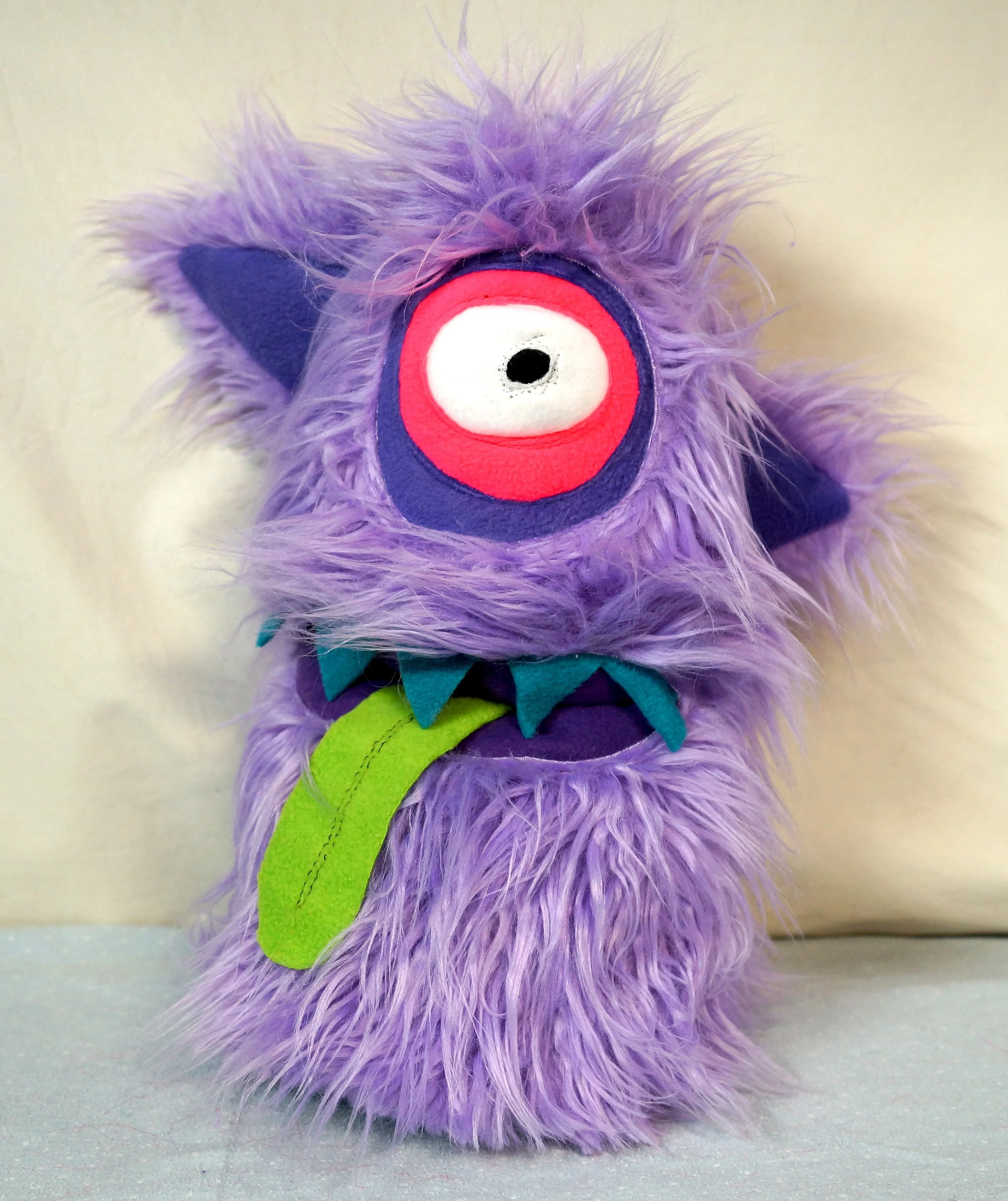 LARGE LIGHT PURPLE MONSTER WITH EARS AND POCKET MOUTH
