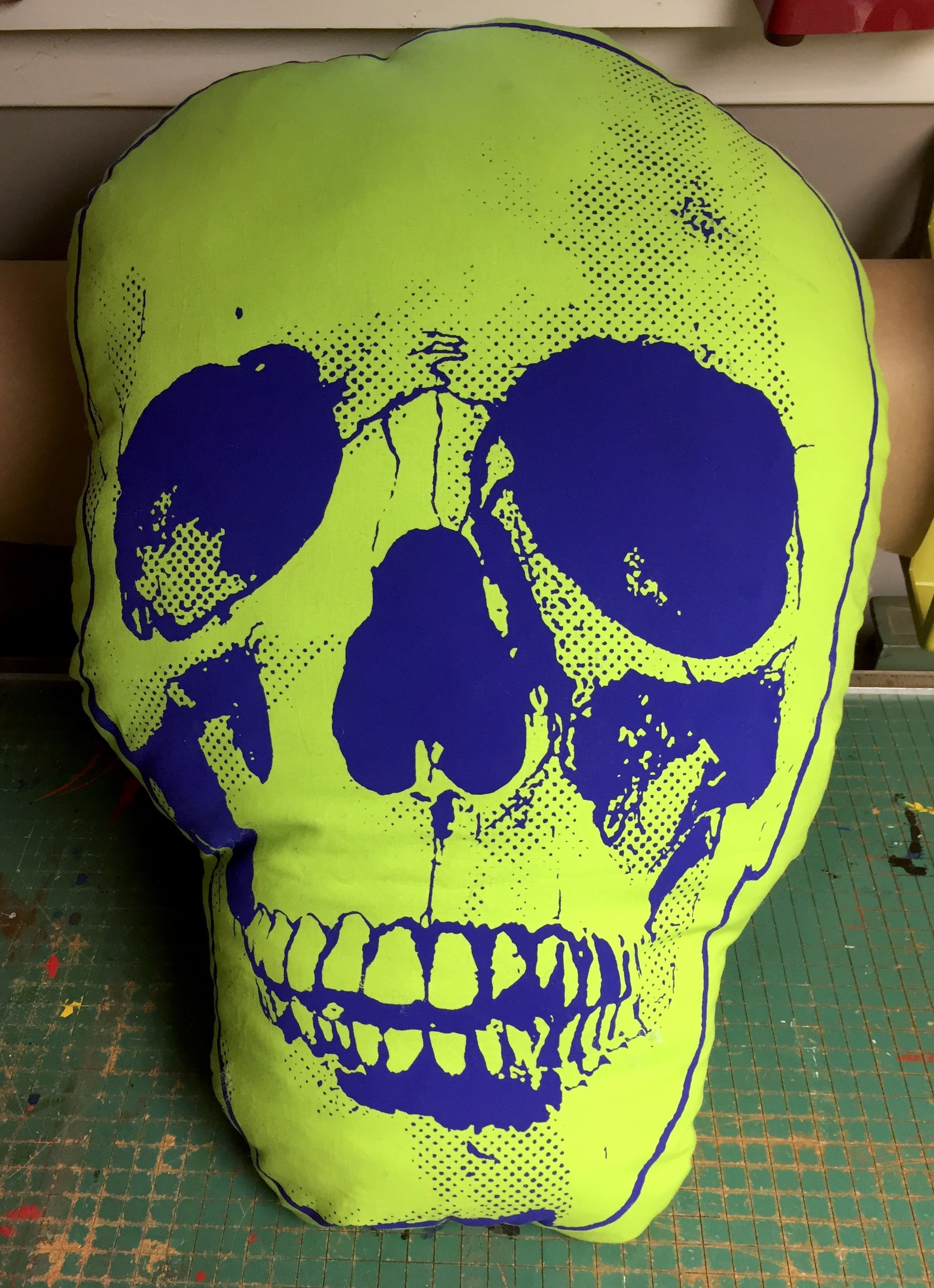 NEON GREEN SCREENPRINTED SKULL PILLOW