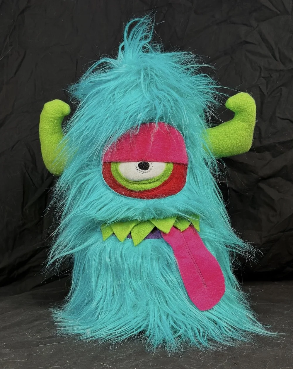 LARGE PINK ONE EYED MONSTER WITH HORNS, POCKET MOUTH & SLIME — TIM