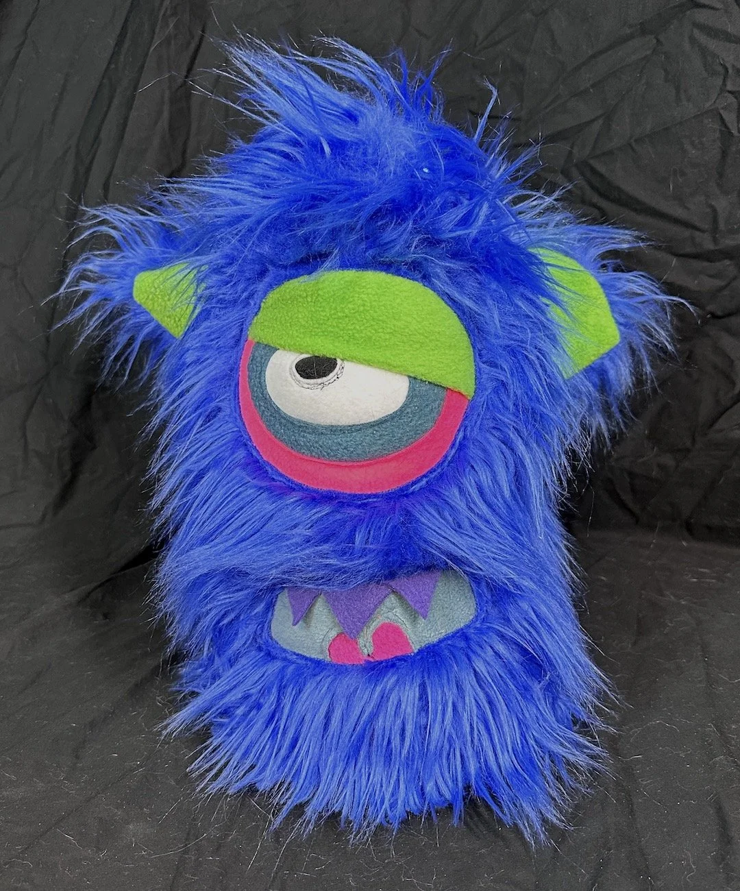 LARGE DARK BLUE MONSTER WITH ONE EYE, EARS