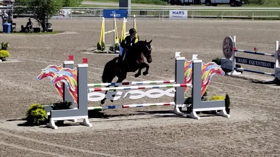 skyfall Bromont jumping.jpg
