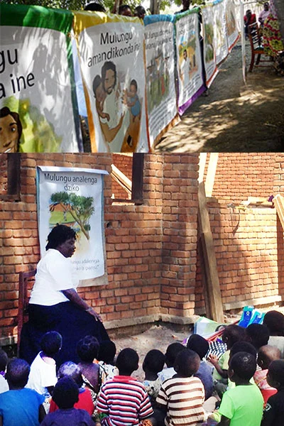 U.S. Coordinator Leslie Lewis says,"If I could show you one thing I saw on my recent trip, it would be the fabulous tool the Bible banners are proving to be in teaching God's Word. " In addition to the key 10 Bible stories and truths children are learning from them, caregivers are also using the banners to teach colors, counting and songs. Frequently, even village adults are seen watching and listening to the lessons from the banners. Children, cooks, parents, chiefs and caregivers are all benefitting.