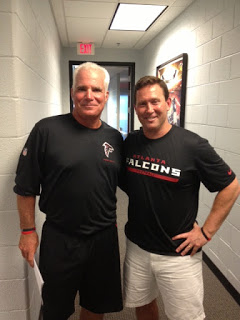 Coach Smith, left. Jon Gordon, right.