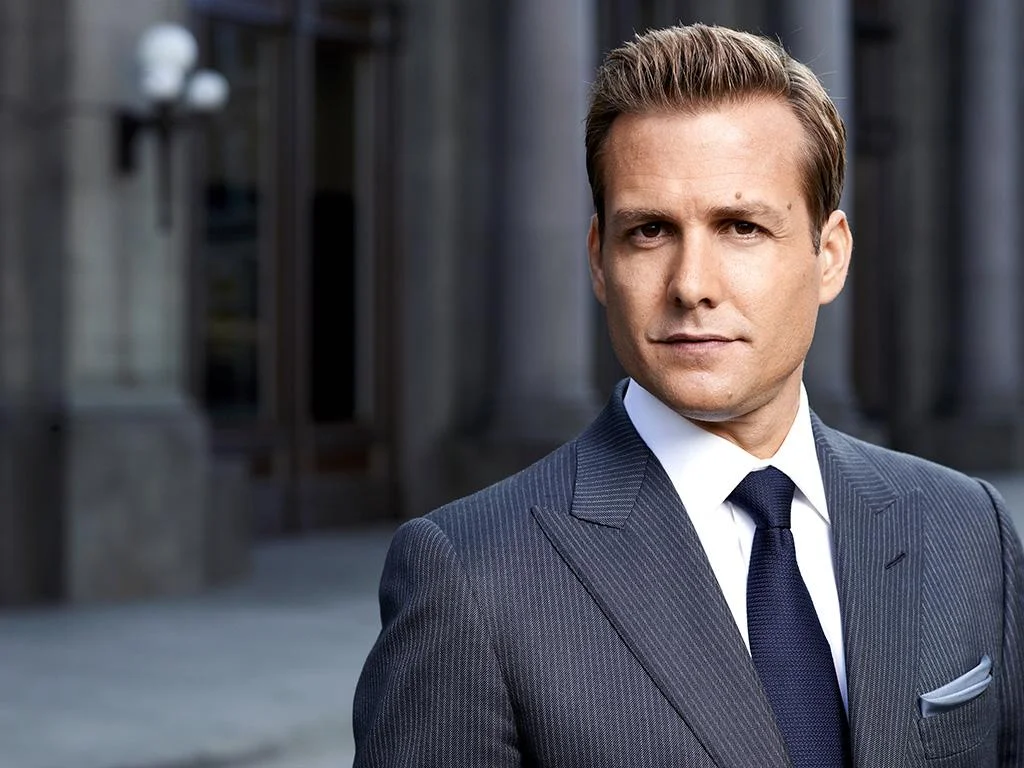 Harvey Specter wearing a peak lapel TOM FORD suit