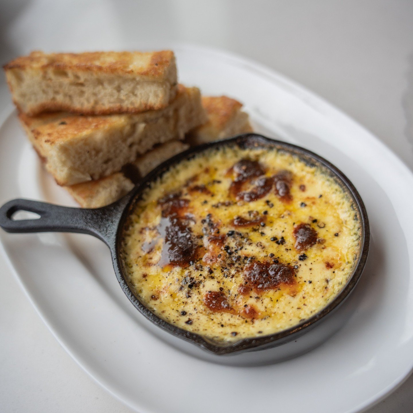 Hungry? We've got something to set your mind at cheese. 🧀 Tag a friend below 👇 that you want to share our Cast Iron Fonduta with.