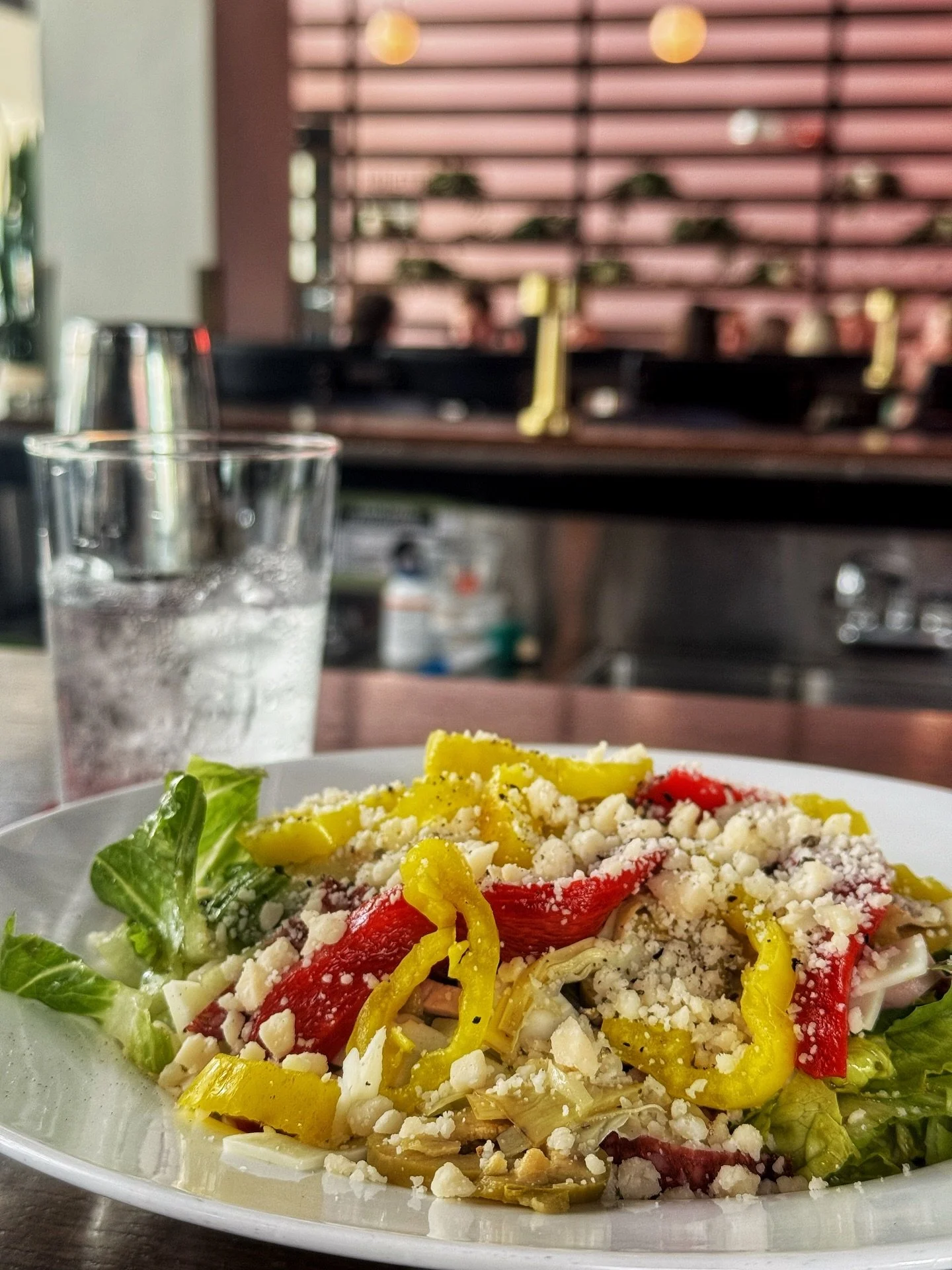 Our Chopped Salad is a classic pizzeria-style salad with little gem lettuce, @eatframani mortadella, pepperoni, and provolone. We top it with olives, roasted peppers, artichokes, and banana peppers in a house-made Italian red wine dressing. It&rsquo;