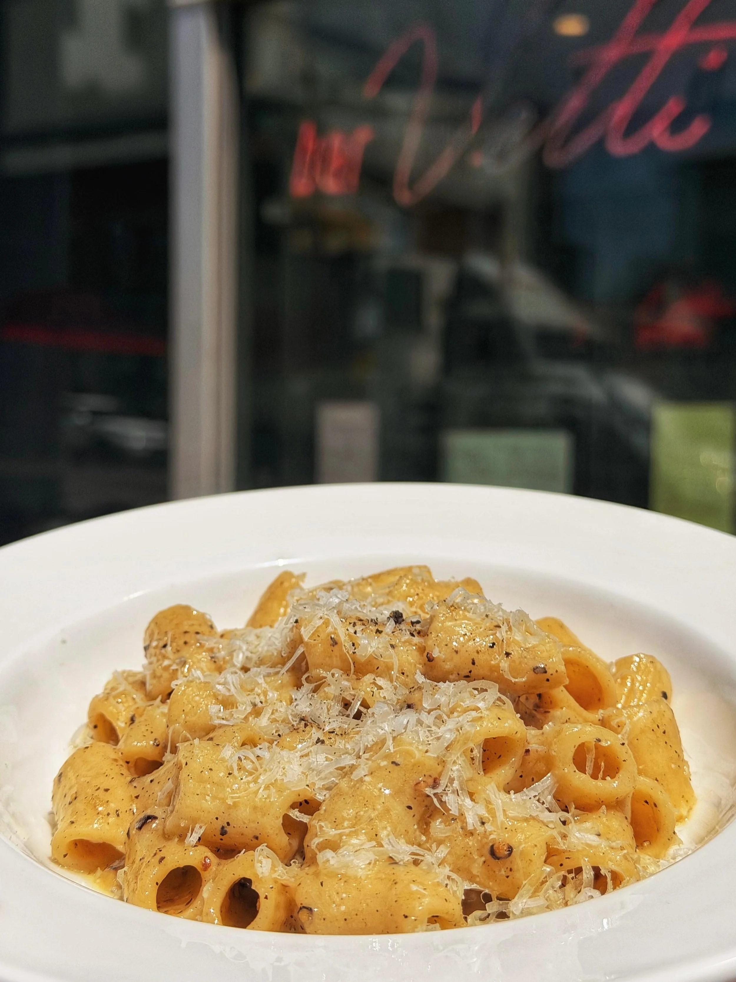 Cacio e Pepe is the result of nothing going to waste. While the Roman classic is just pecorino and black pepper, we use the buttermilk whey (the liquid left over from our house ricotta) to make the sauce. We extrude the rigatoni in-house to ensure th