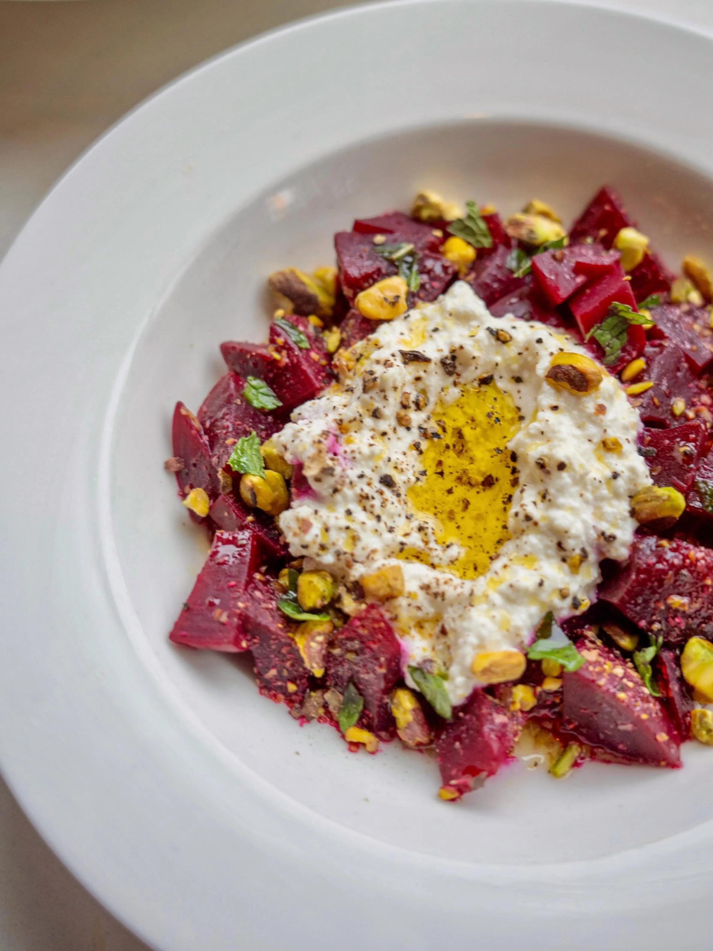 We follow a fiver rule in our kitchen: use no more than five main components so the ingredients can stand out. For example, our Beets &amp; Ricotta starts with citrus-marinated beets and served with house-made buttermilk ricotta, pistachios, and fres