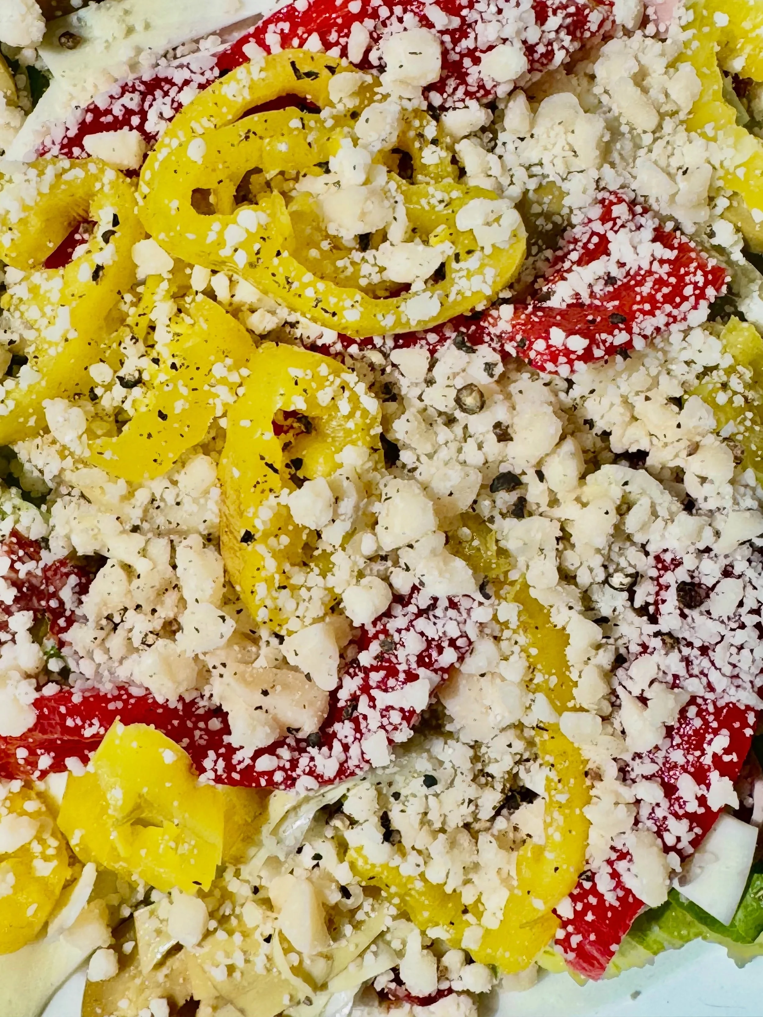 Every Wednesday, Thursday, and Friday from 11:00 AM to 2:00 PM, we offer our lunch-exclusive Chopped Salad - mortadella, pepperoni, provolone, olives, roasted peppers, artichokes, banana peppers, and house Italian dressing.