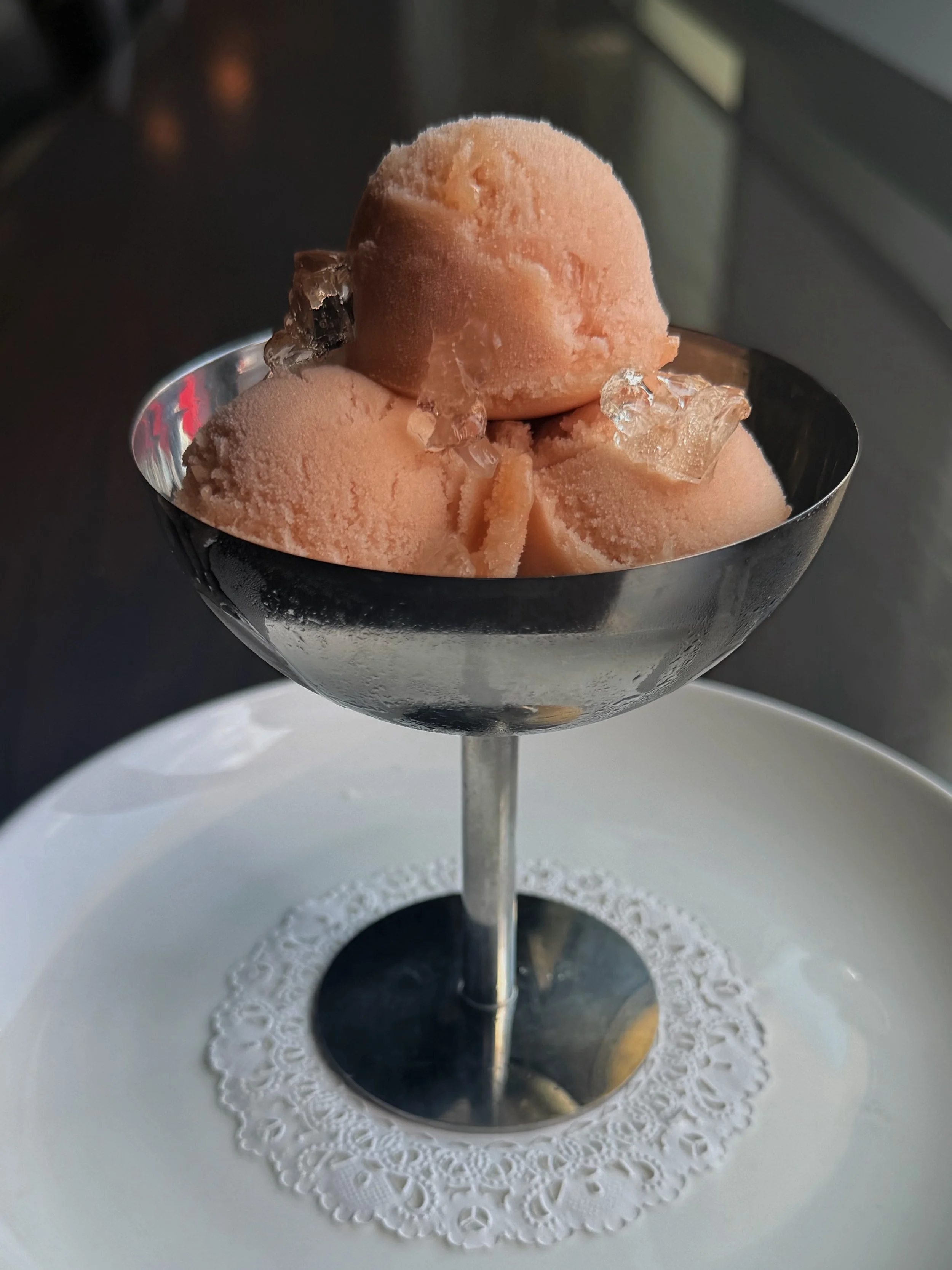 A hot day like today calls for Bellini Sorbet topped with prosecco jellies.