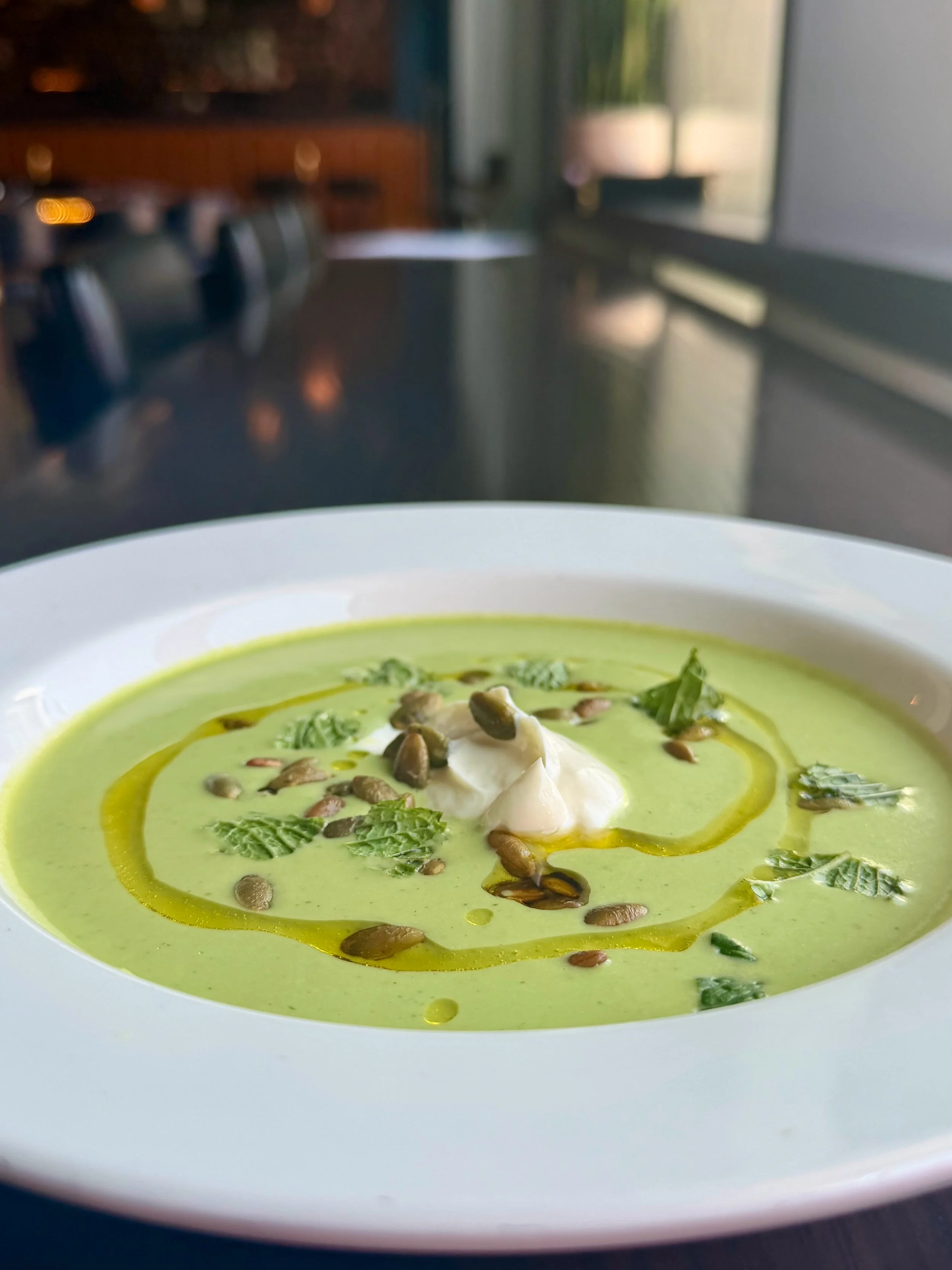 Our **Chilled** Cucumber Honeydew Soup might be the best soup to help you cool off today as we see temps hit close to 100&deg;. Crema, spicy pepitas, extra virgin olive oil.